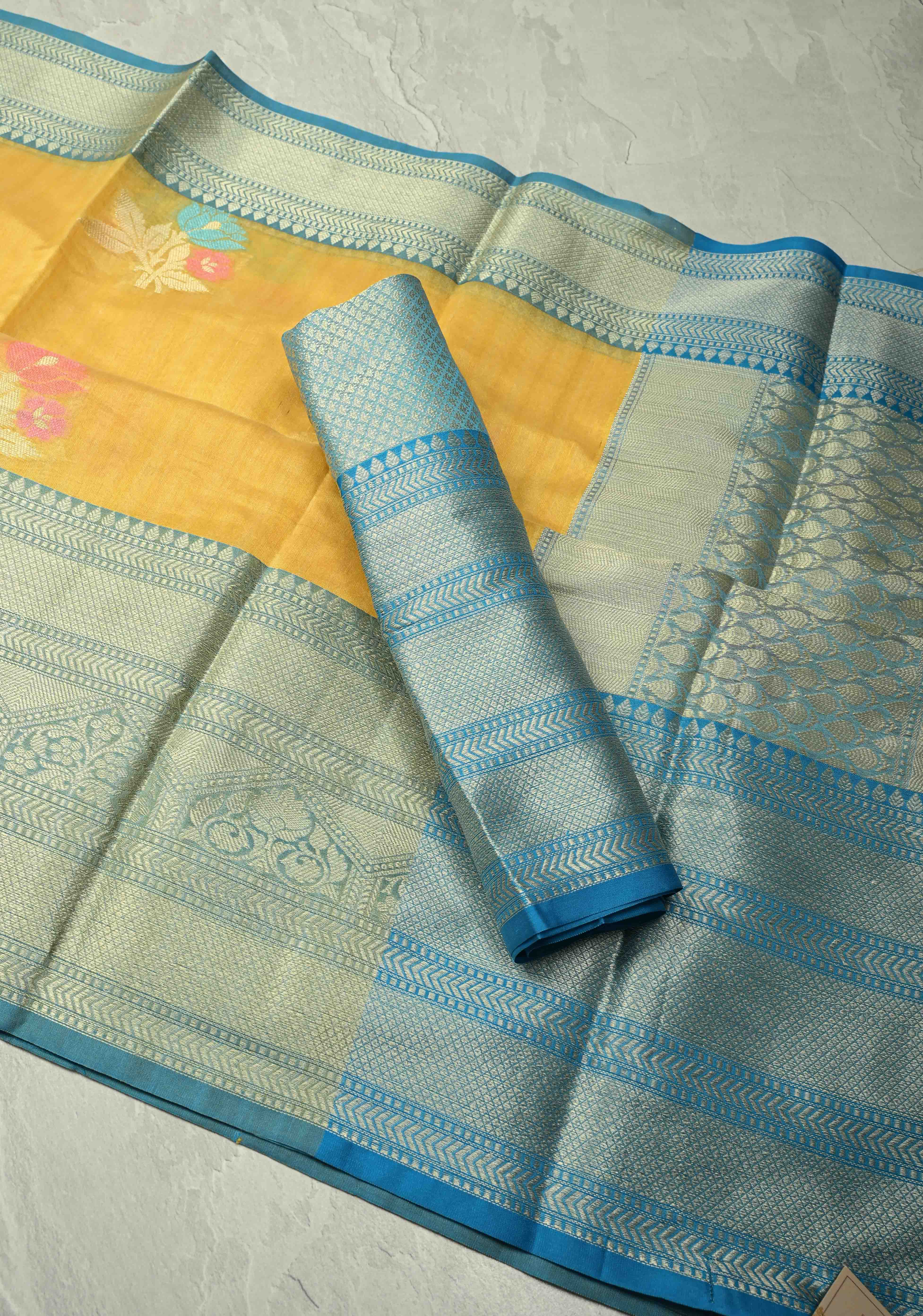 Mango Yellow Banarasi Semi Kora Saree with Meenakari Floral Buttas and Contrast Wide Zari Border | Shobitam
