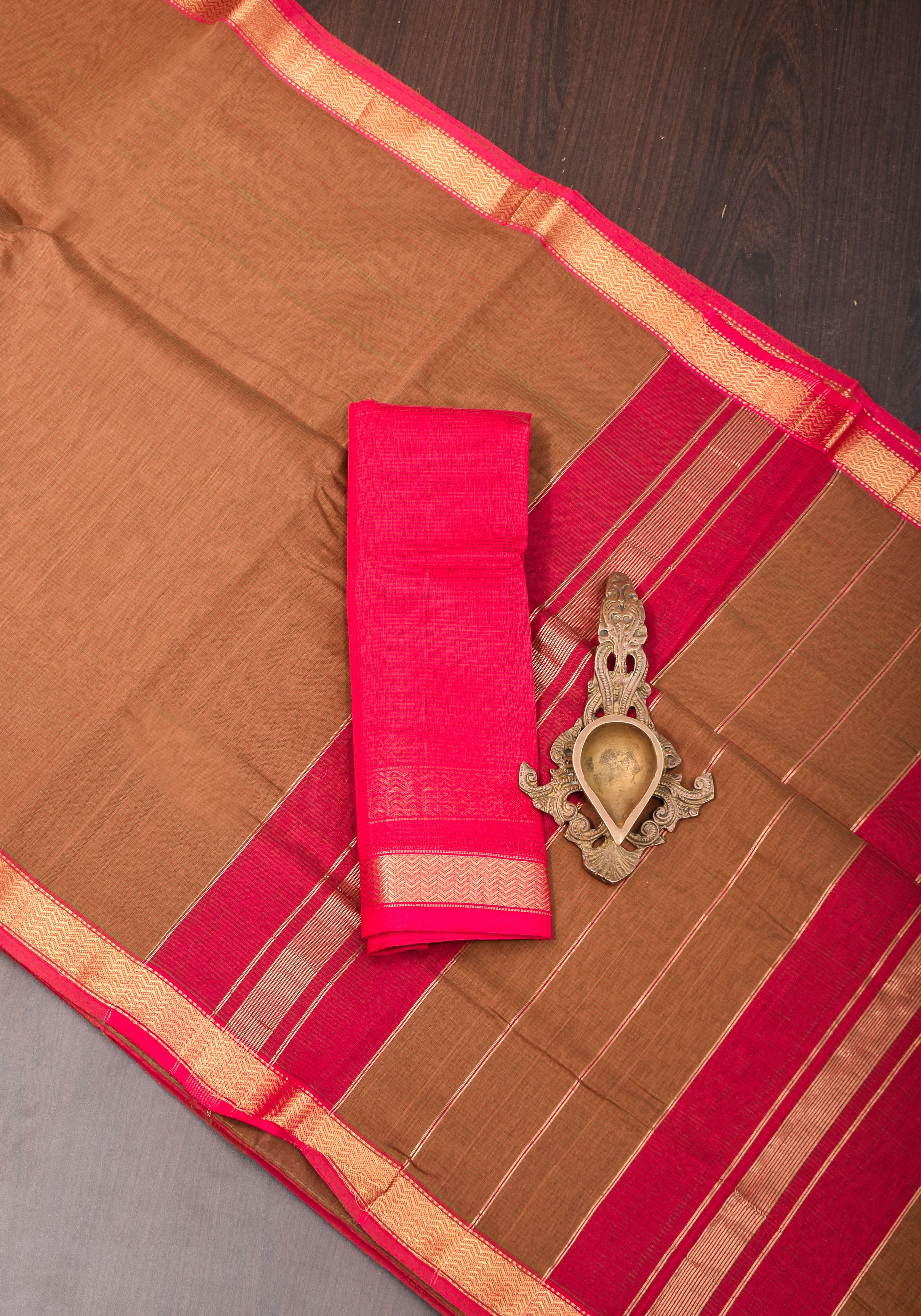 Handwoven Maheshwari Silk Cotton Saree in brown With Stripes & Minimal zari borders | Shobitam