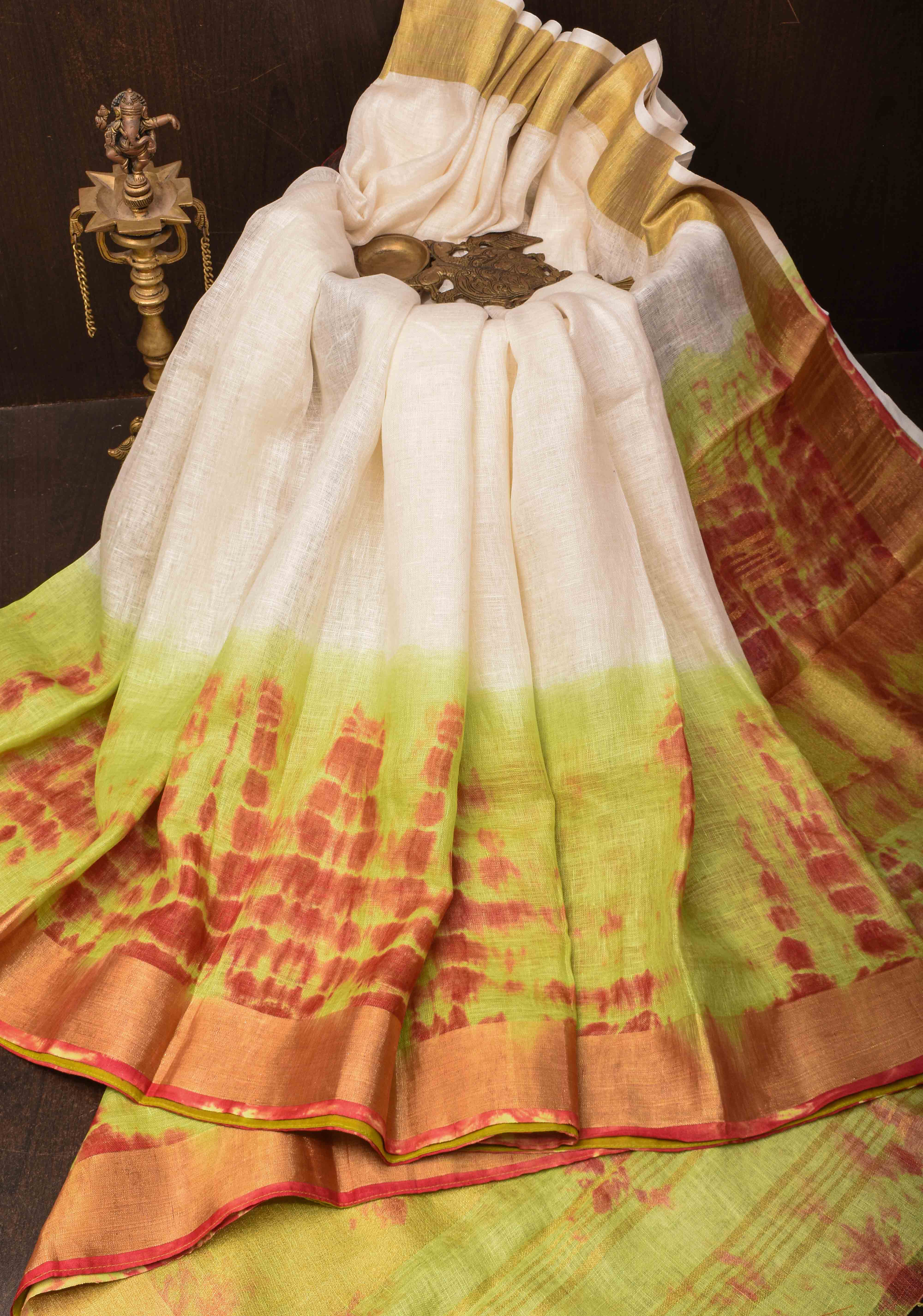 Off White and Green Shibori Linen by Linen Saree and Zari Border | Shobitam