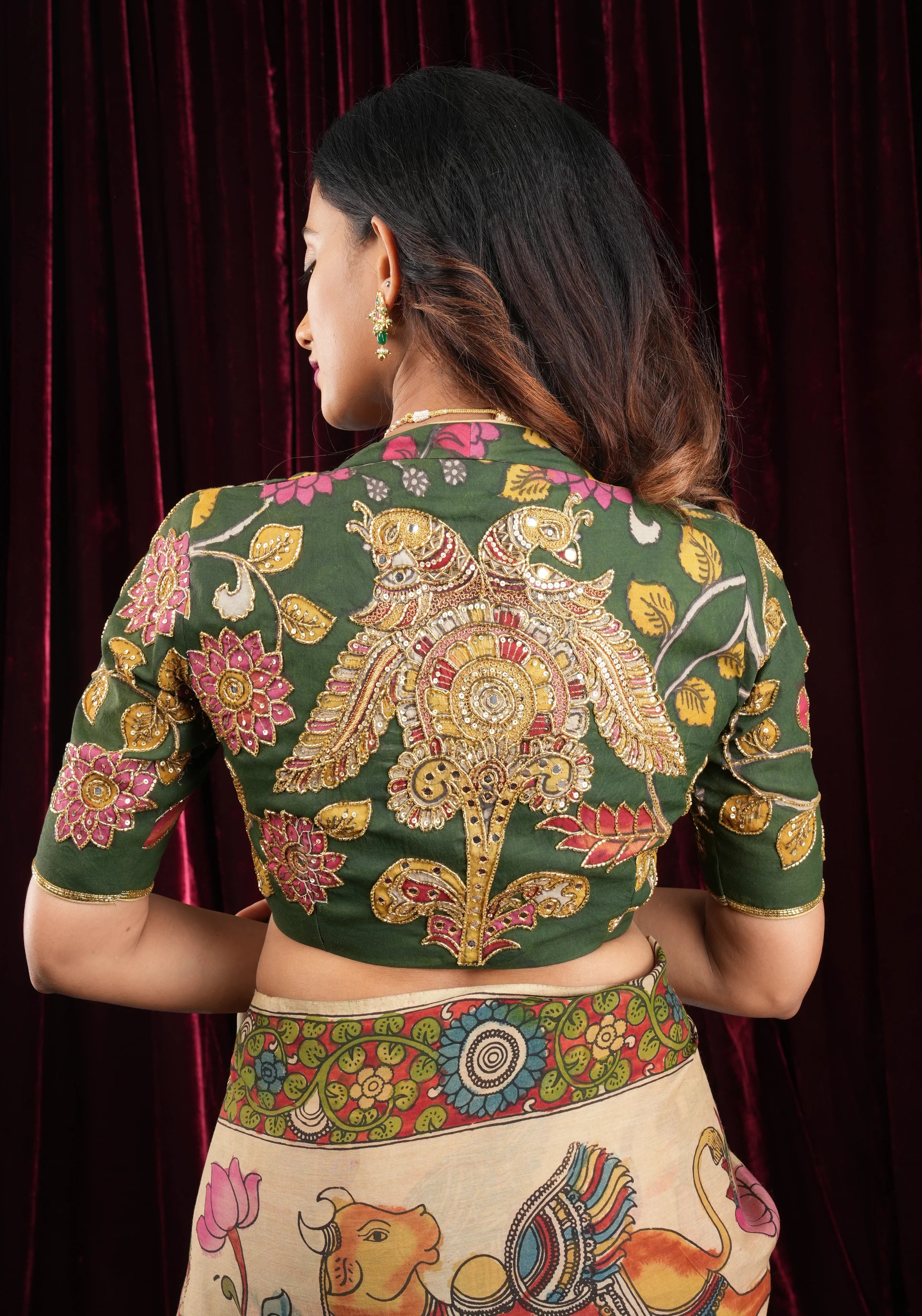 Pure Pen Kalamkari Blouse in olive green with peacock motifs and cutdana sequin hand work