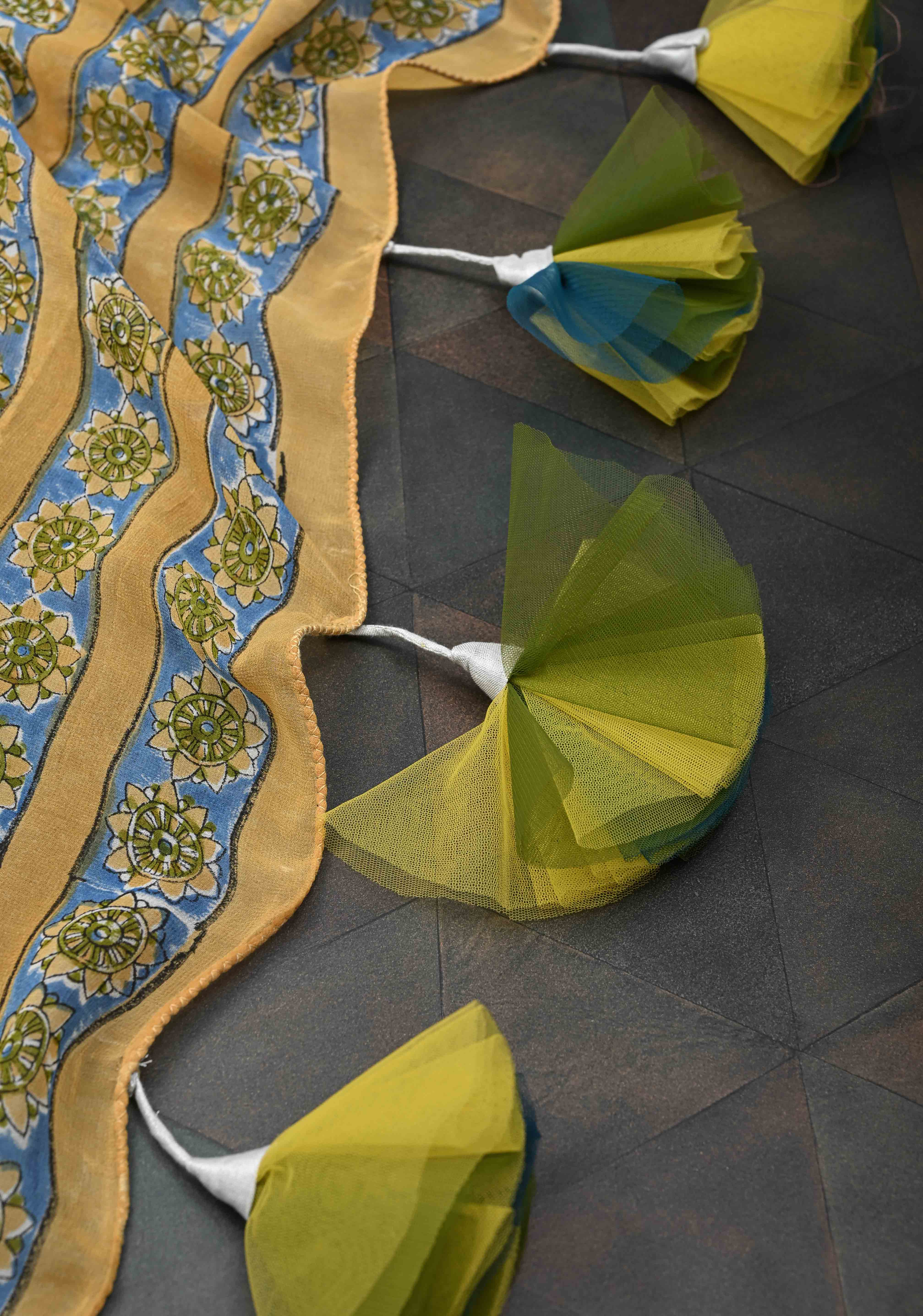 Pale Mustard Georgette Saree with Sanganeri Hand Block Print and long net tassels