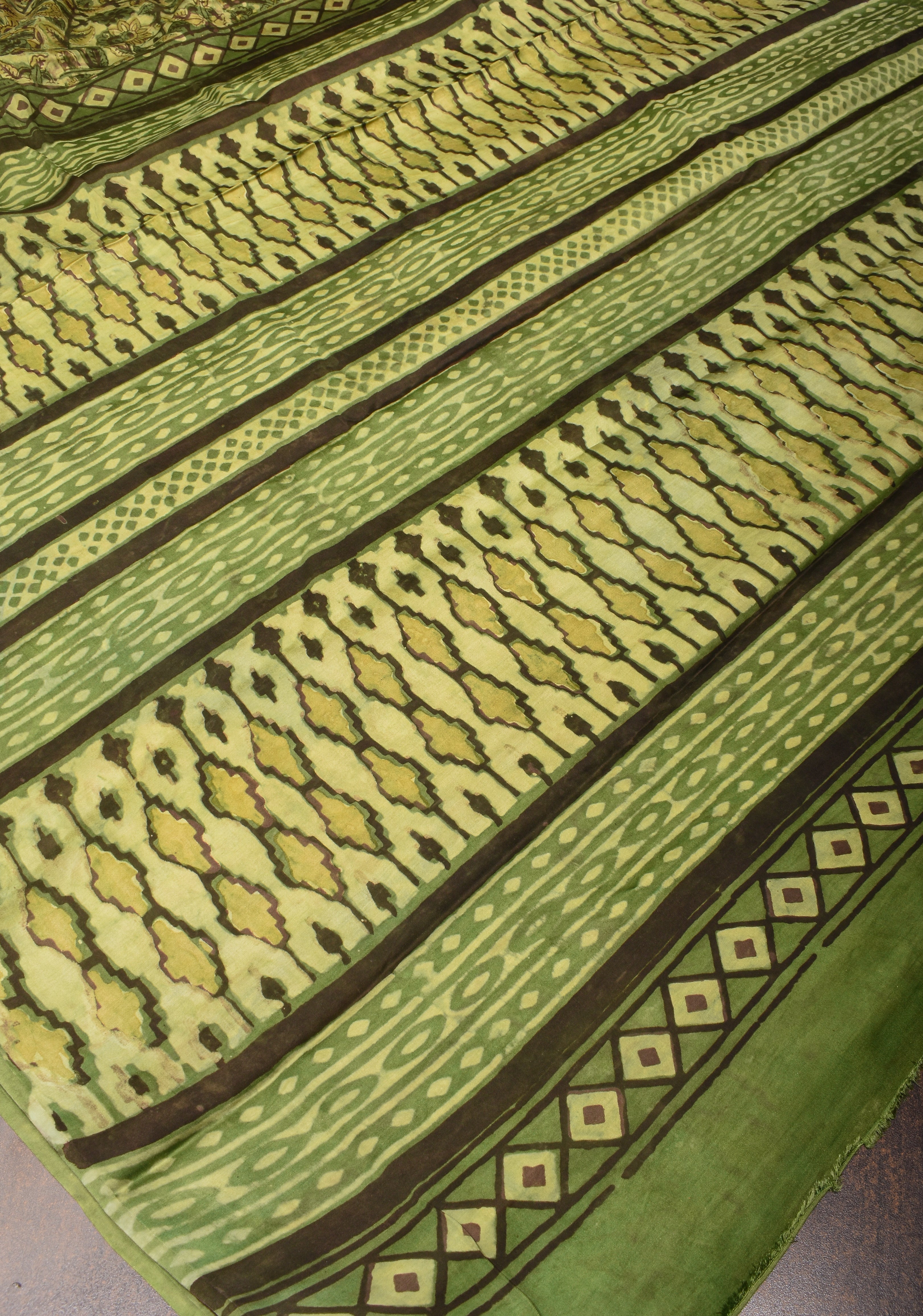 Vanaspati Hand Block Print on Modal Silk Saree in Moss Green with Kalamkari Border and Angoor latkans | Shobitam