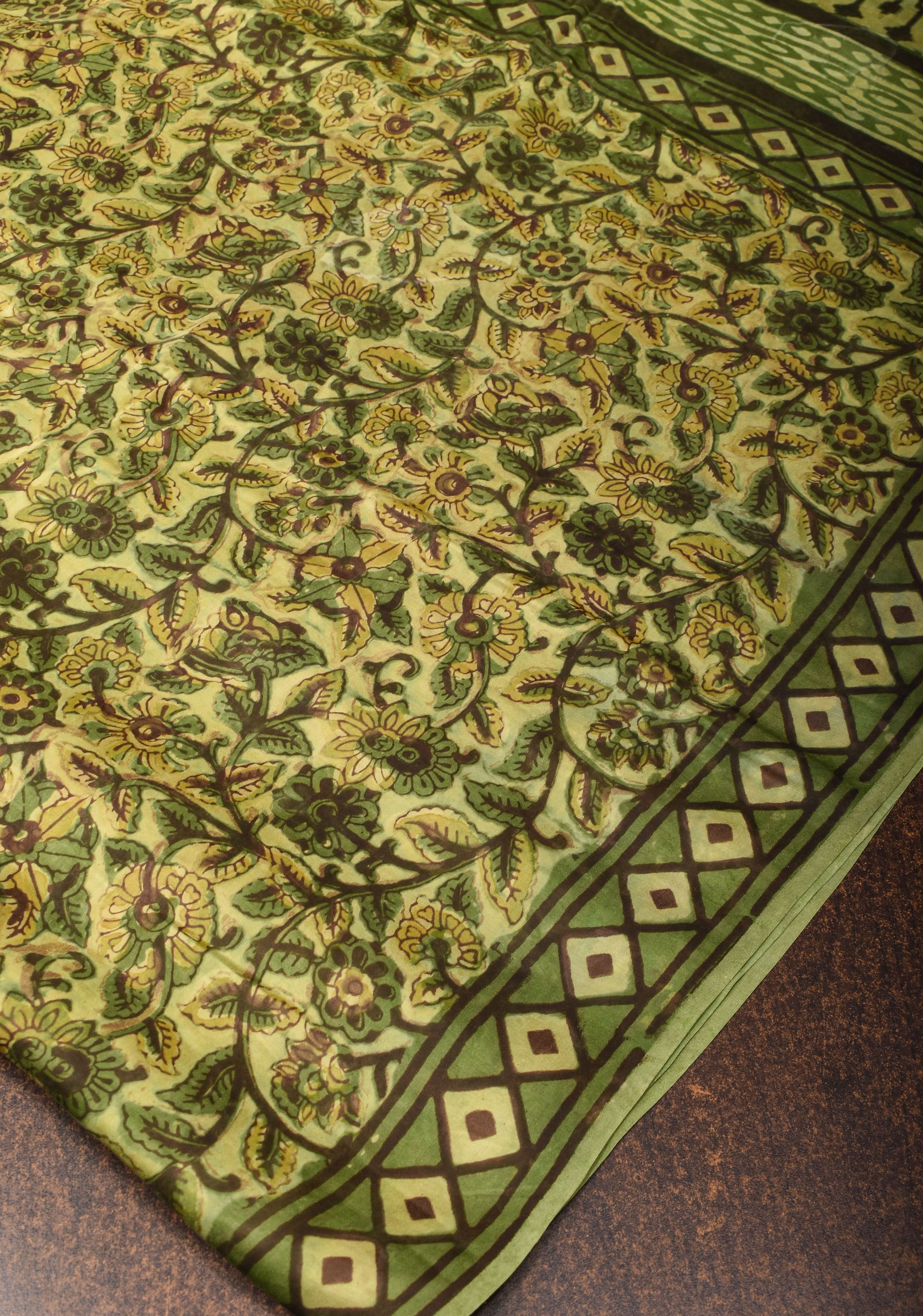 Vanaspati Hand Block Print on Modal Silk Saree in Moss Green with Kalamkari Border and Angoor latkans | Shobitam
