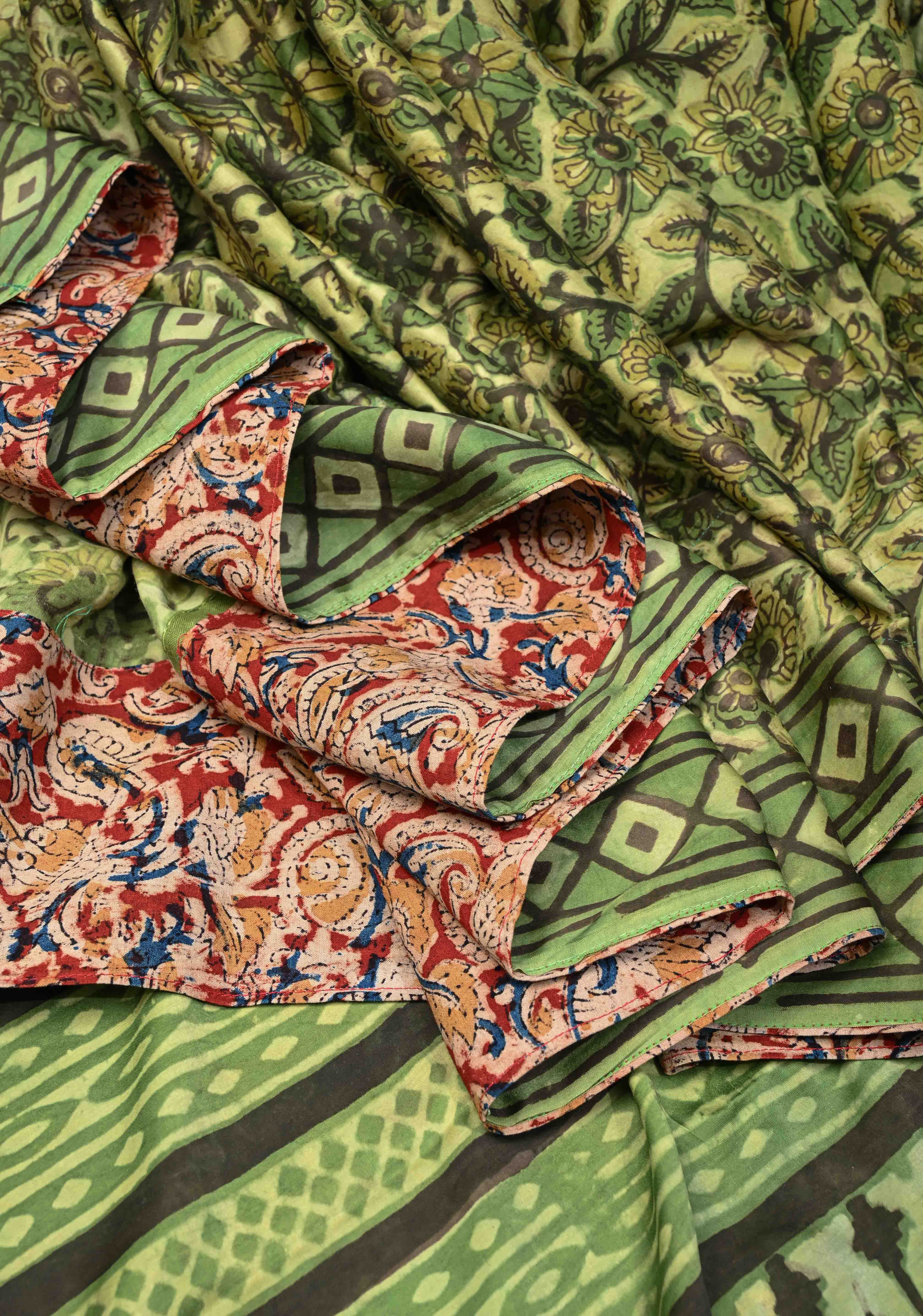 Vanaspati Hand Block Print on Modal Silk Saree in Moss Green with Kalamkari Border and Angoor latkans | Shobitam