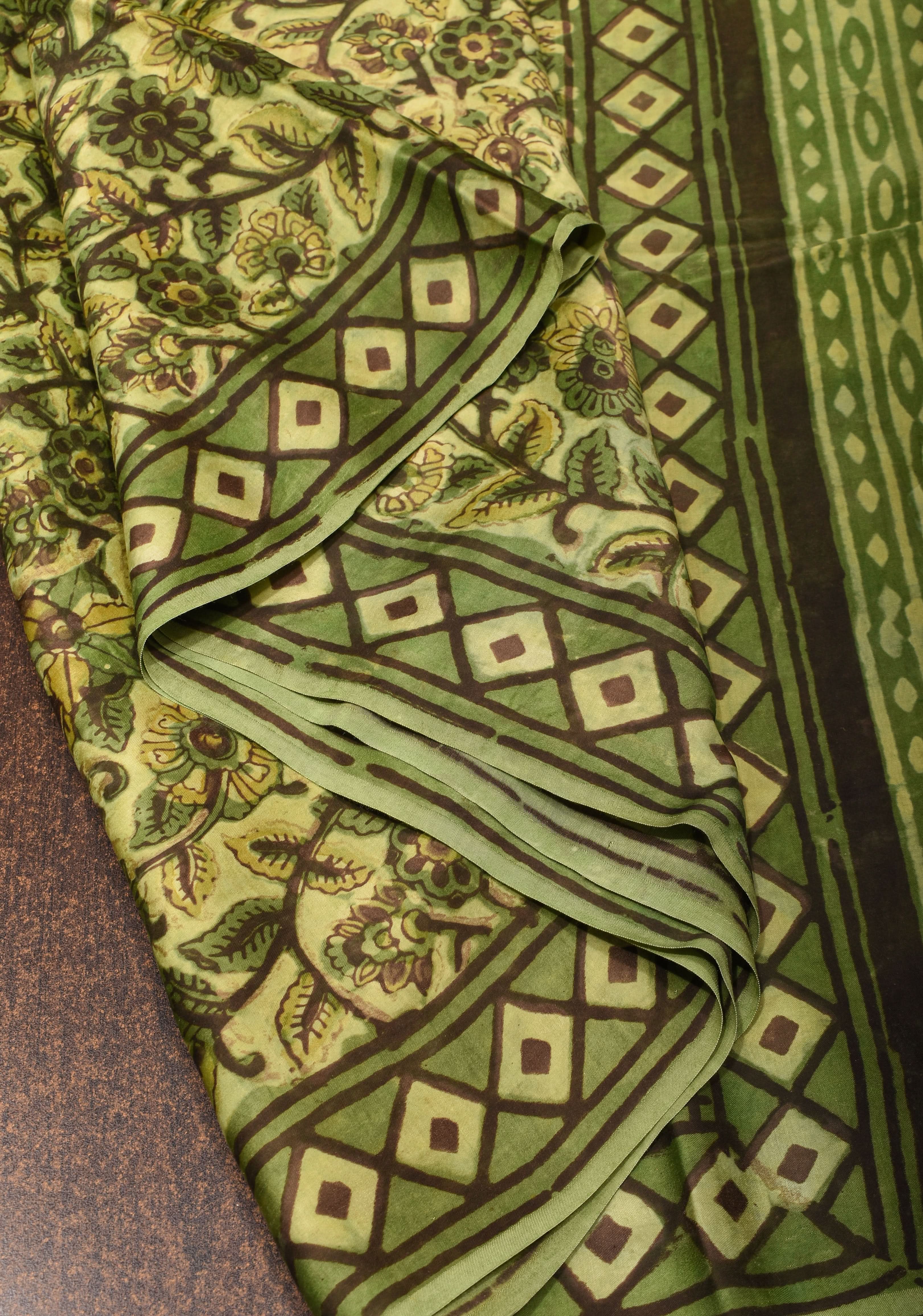 Vanaspati Hand Block Print on Modal Silk Saree in Moss Green with Kalamkari Border and Angoor latkans | Shobitam