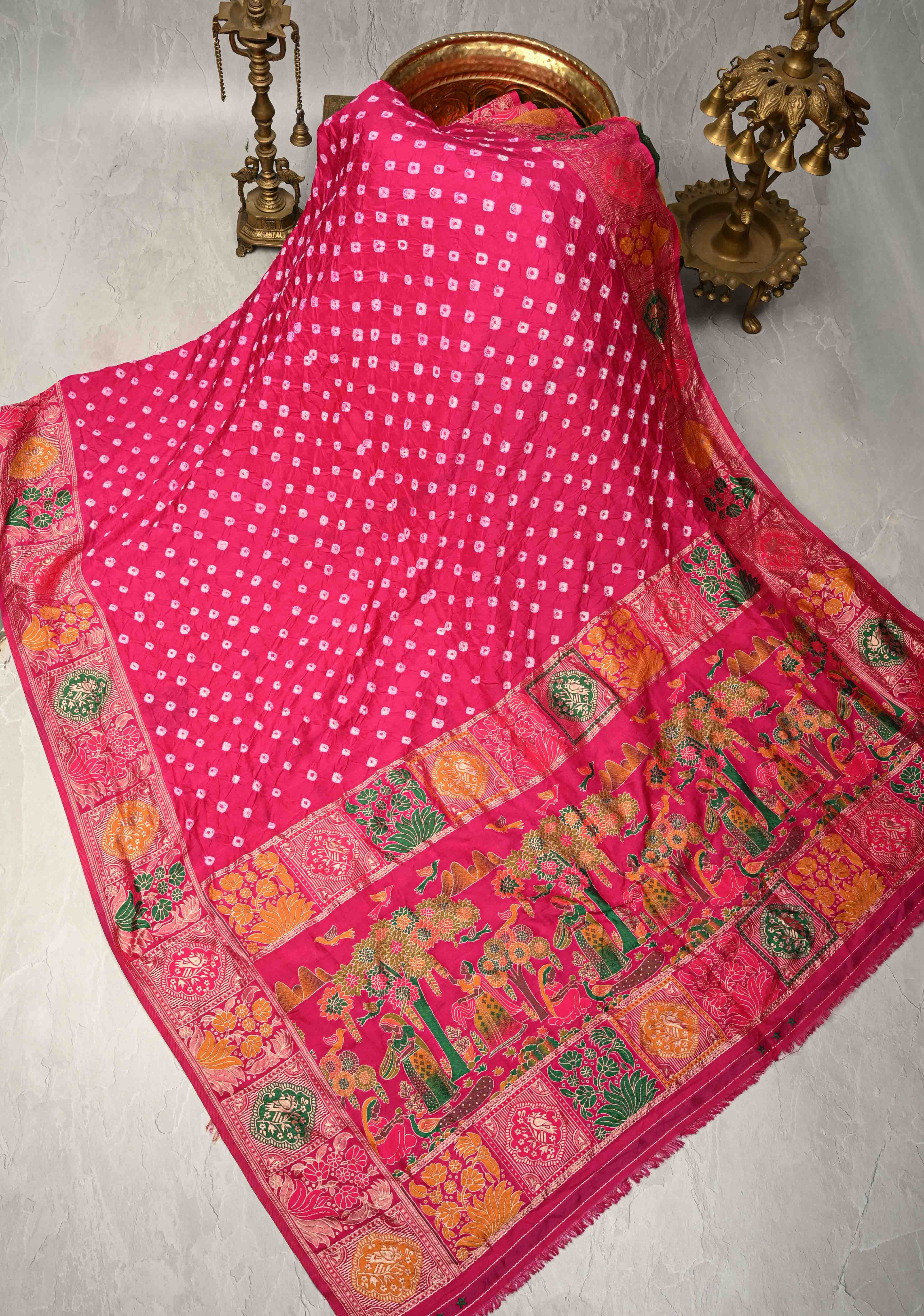 Fuchsia Pink Crushed Bandhini on Art Silk Saree with Meenakari Zari Border and Village Theme Pallu | Shobitam