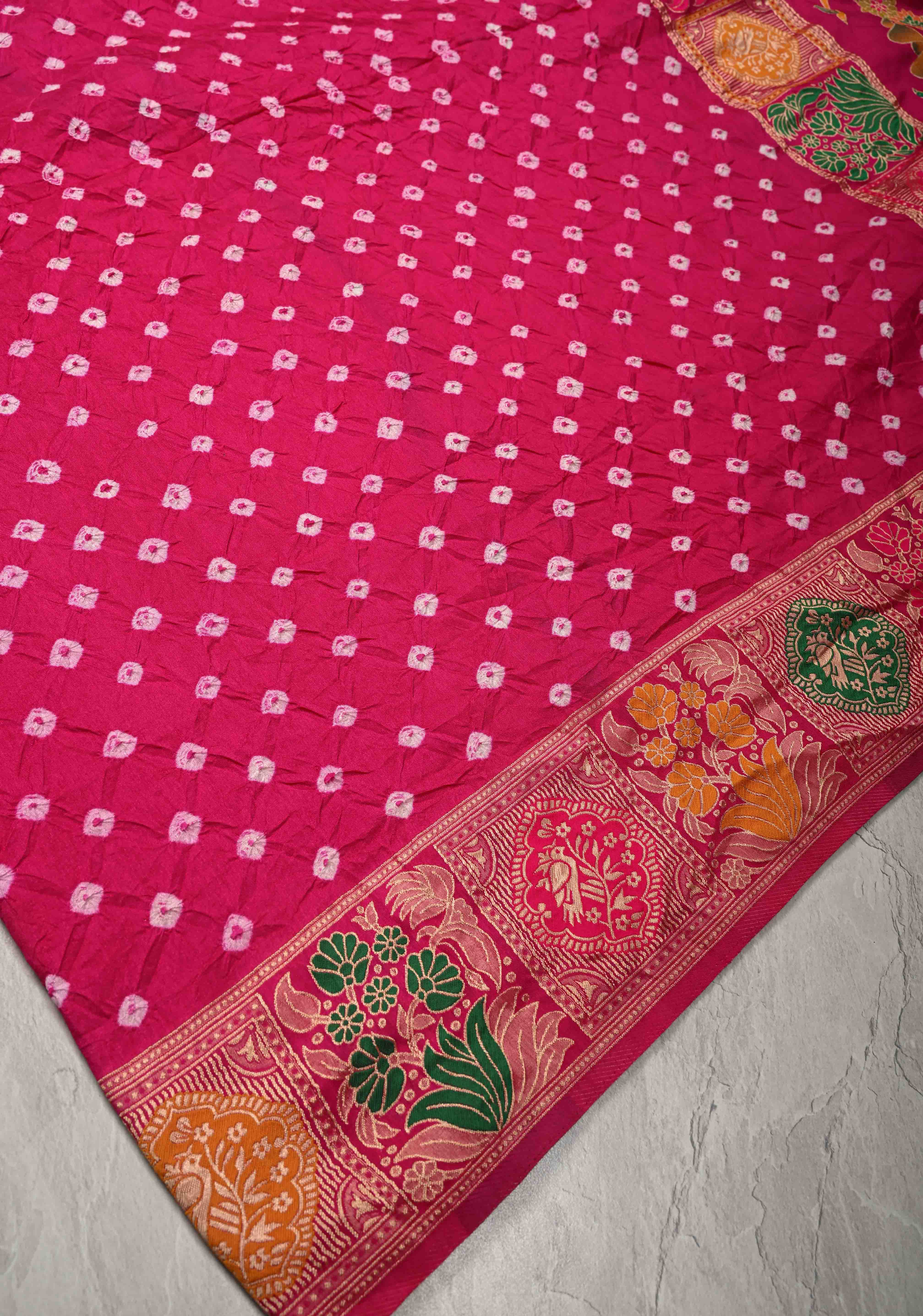 Fuchsia Pink Crushed Bandhini on Art Silk Saree with Meenakari Zari Border and Village Theme Pallu | Shobitam