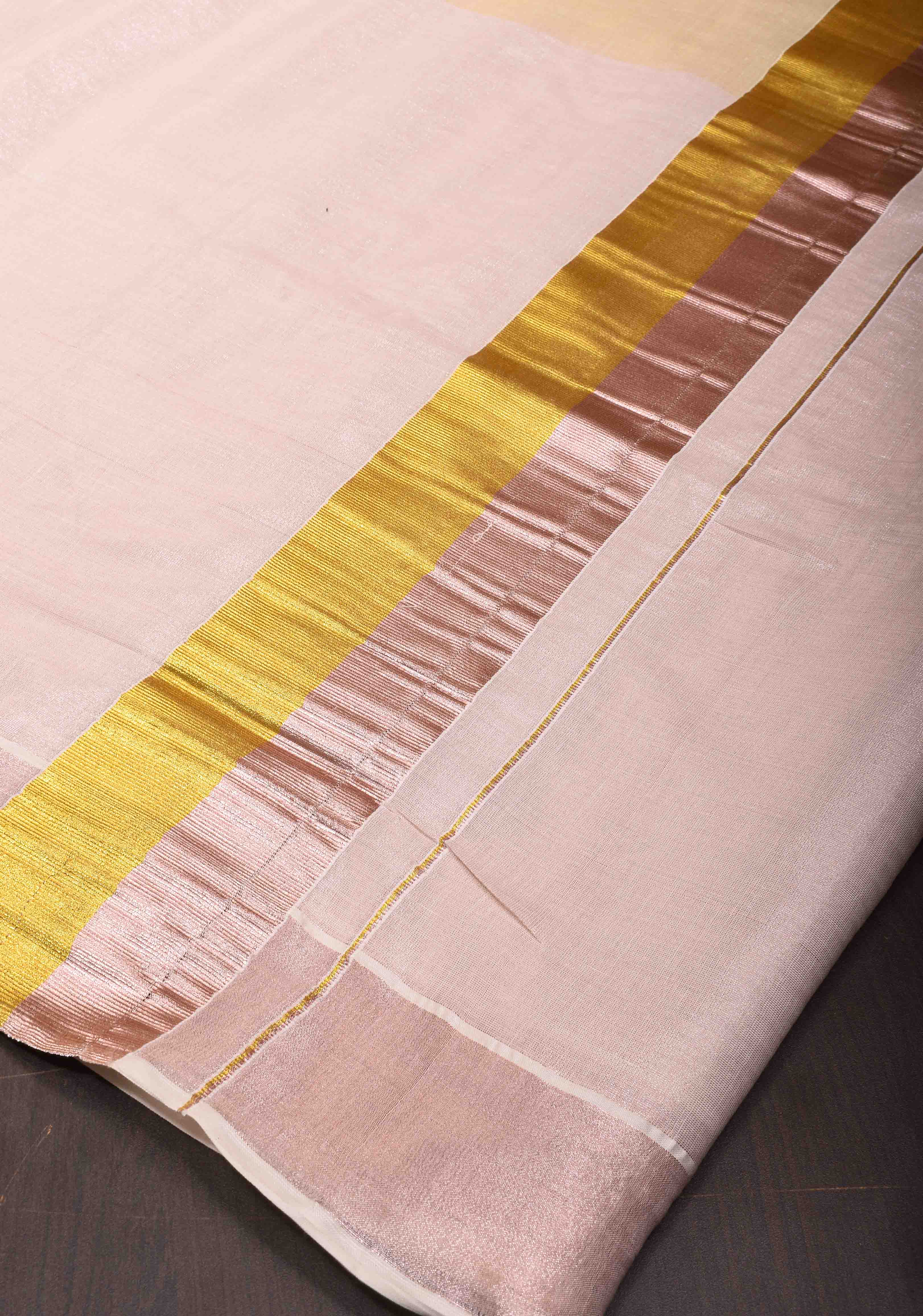 Elegant Kerala Kasavu Half Tissue Saree in White and Gold – A Timeless Classic | Shobitam