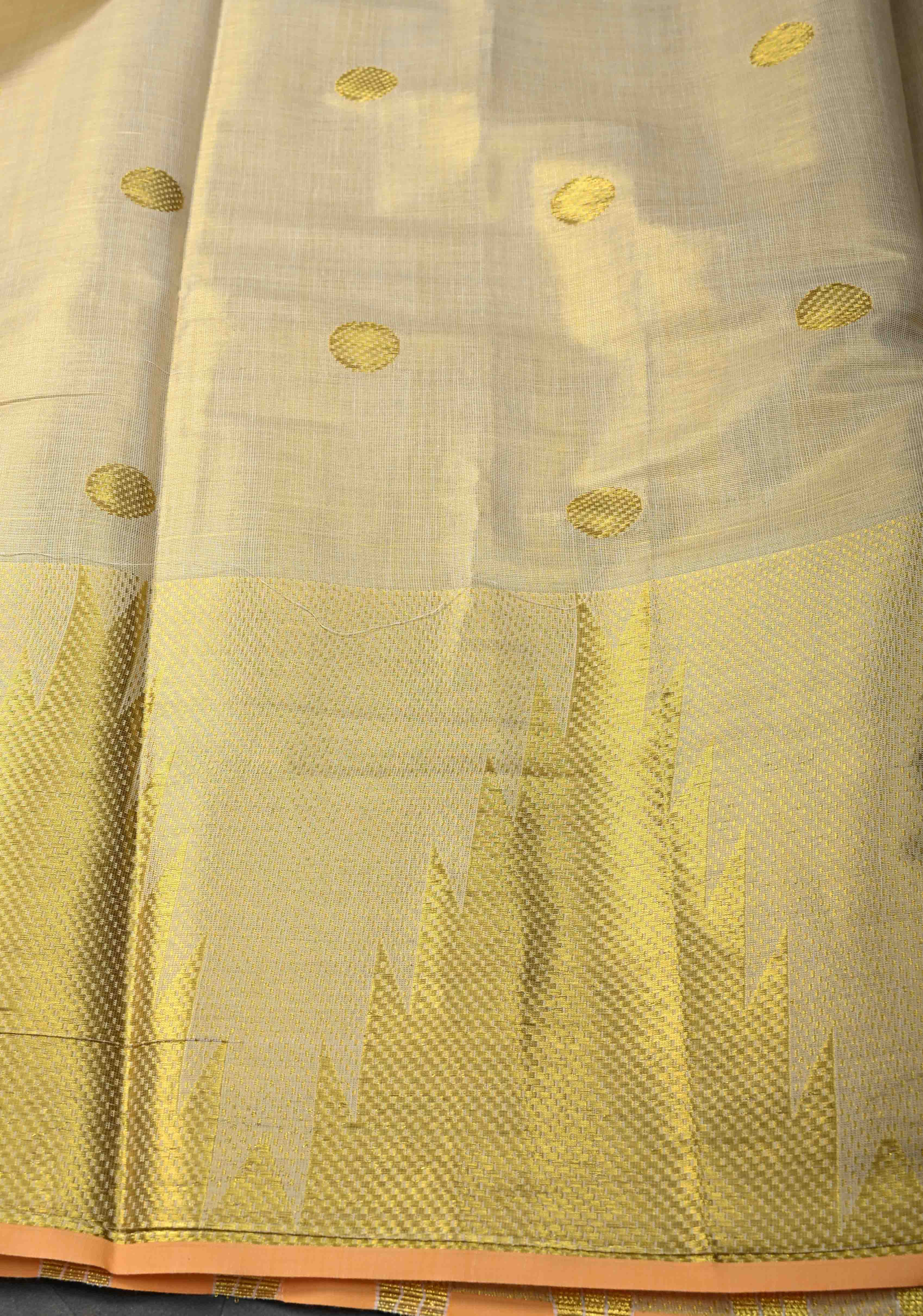 Beige Tissue Cotton Saree with Zari Coin Buttis And Temple Border | Shobitam