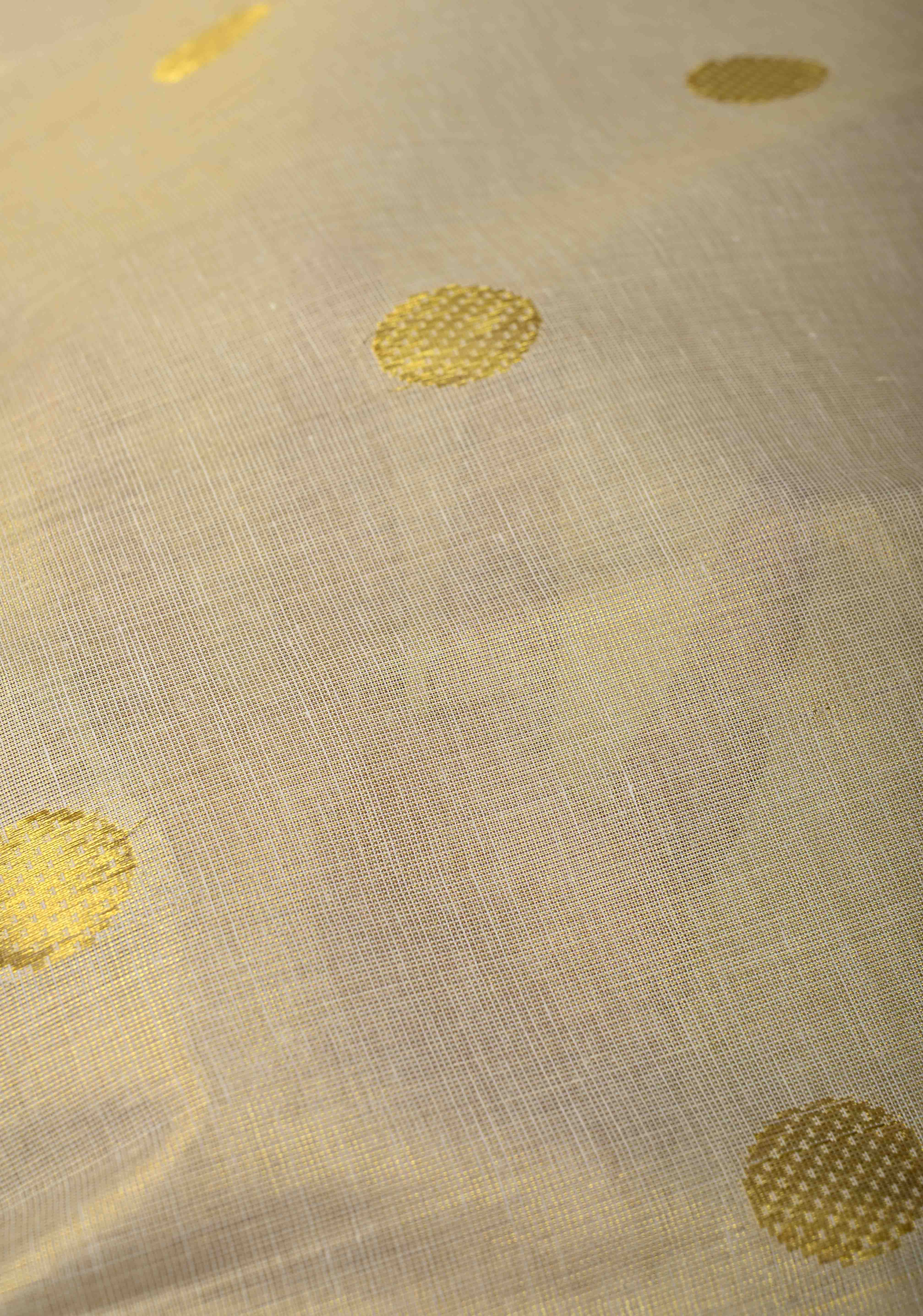 Beige Tissue Cotton Saree with Zari Coin Buttis And Temple Border | Shobitam