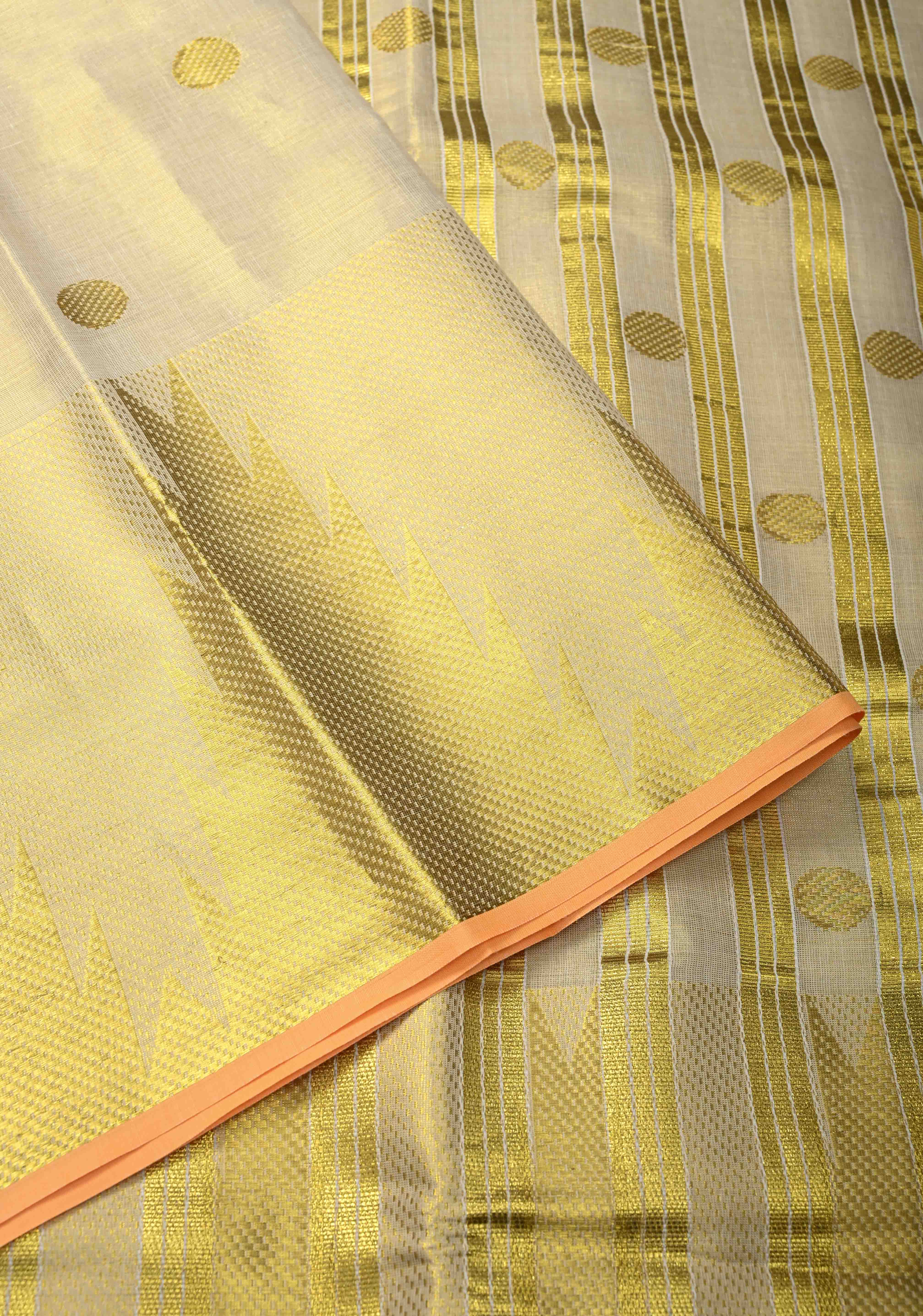Beige Tissue Cotton Saree with Zari Coin Buttis And Temple Border | Shobitam