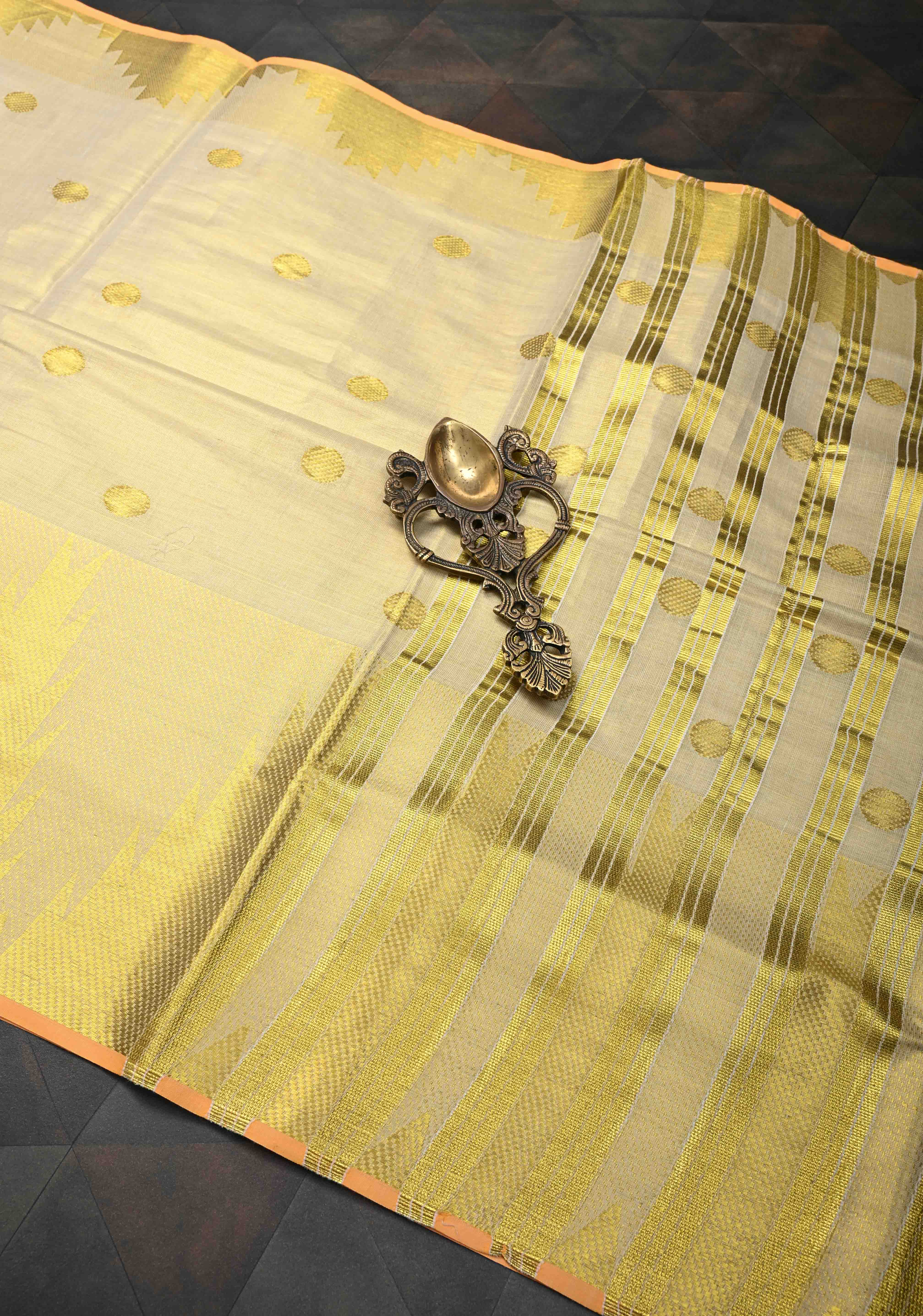 Beige Tissue Cotton Saree with Zari Coin Buttis And Temple Border | Shobitam