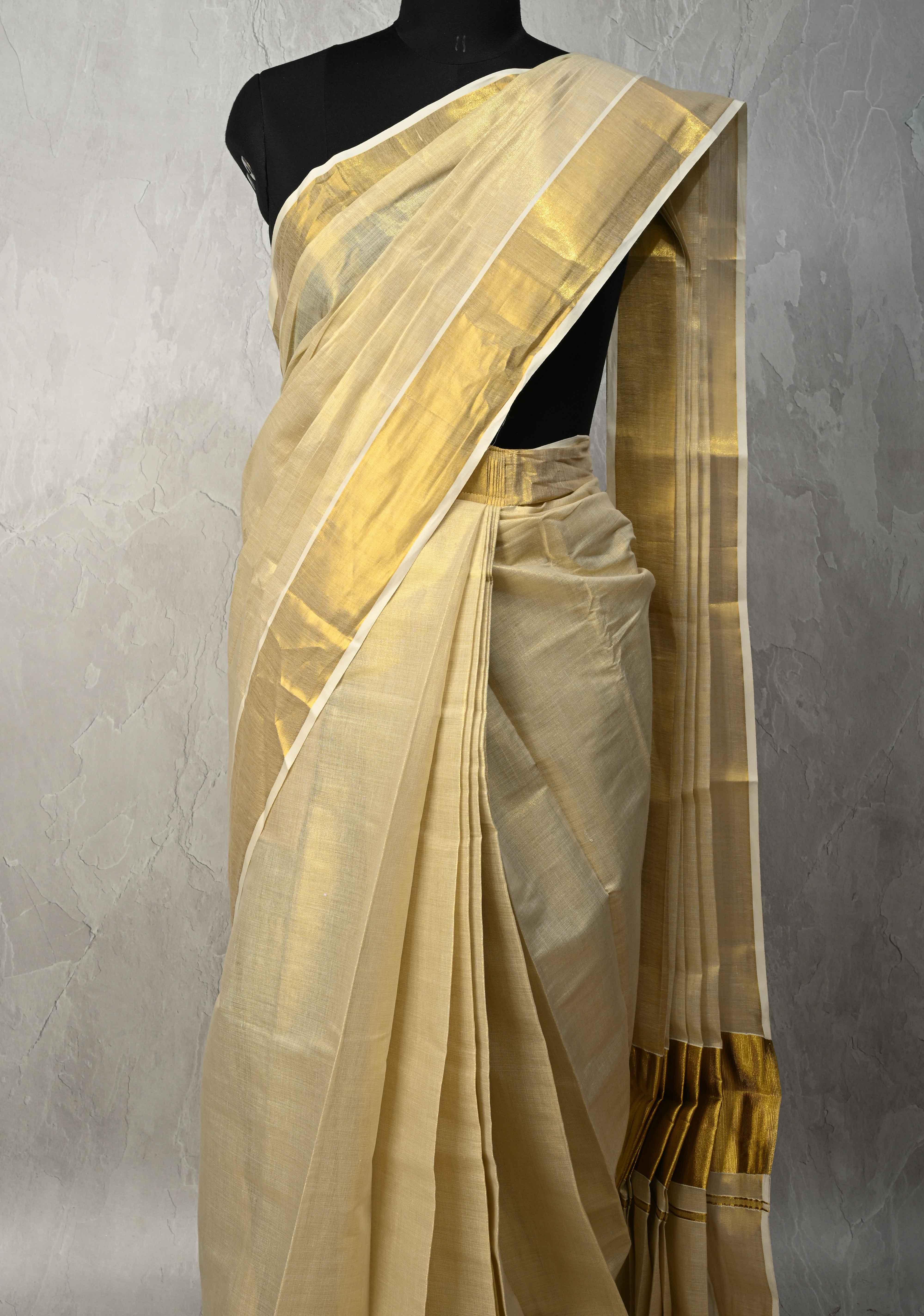 Off White Pre Stitch Adjustable Kerala Kasavu Cotton Tissue Saree with Zari Borders and pocket | Shobitam