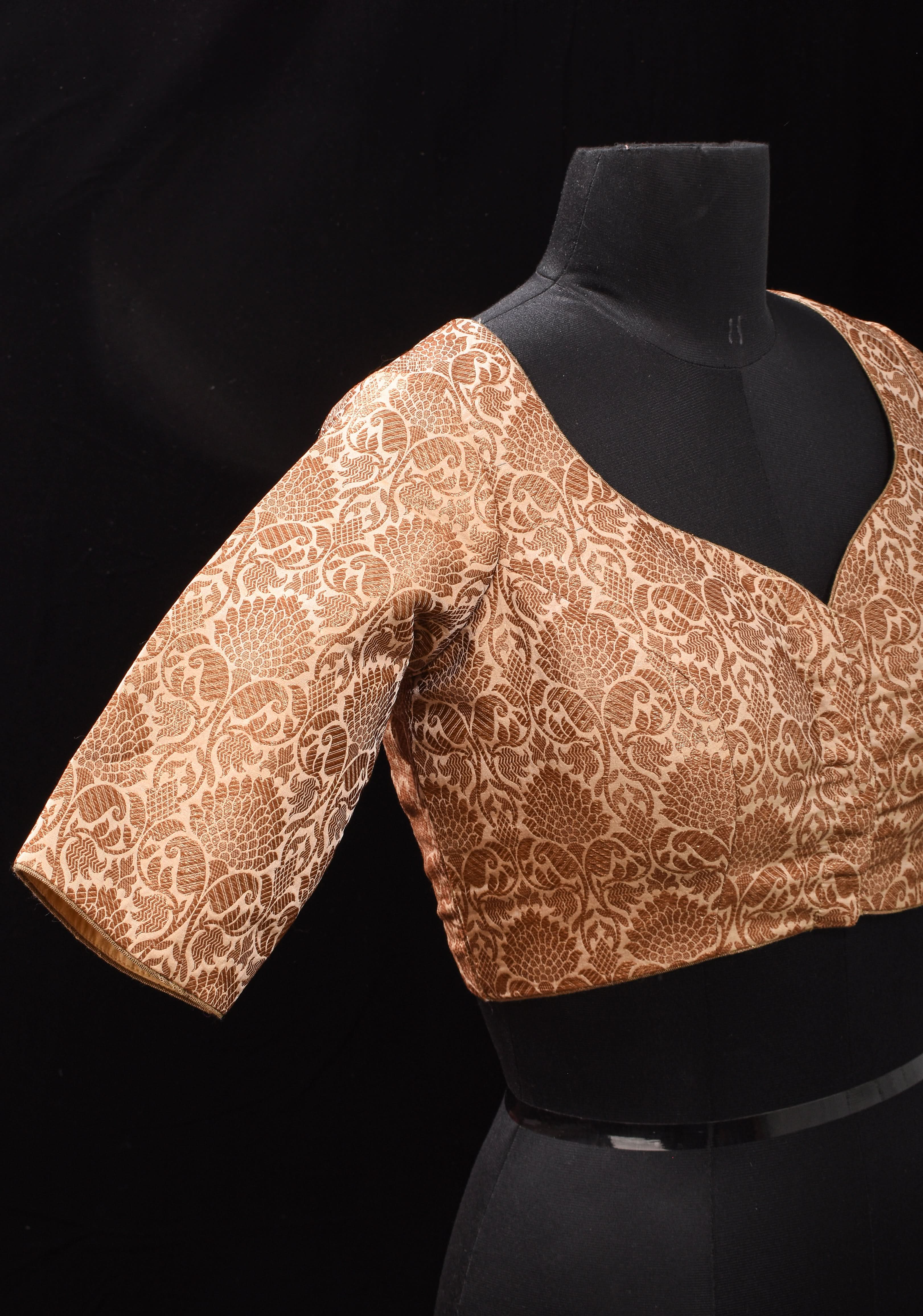 Elegant Antique Gold Floral Brocade Banarasi blouse with leaf and matka neck, Made to Order | Shobitam