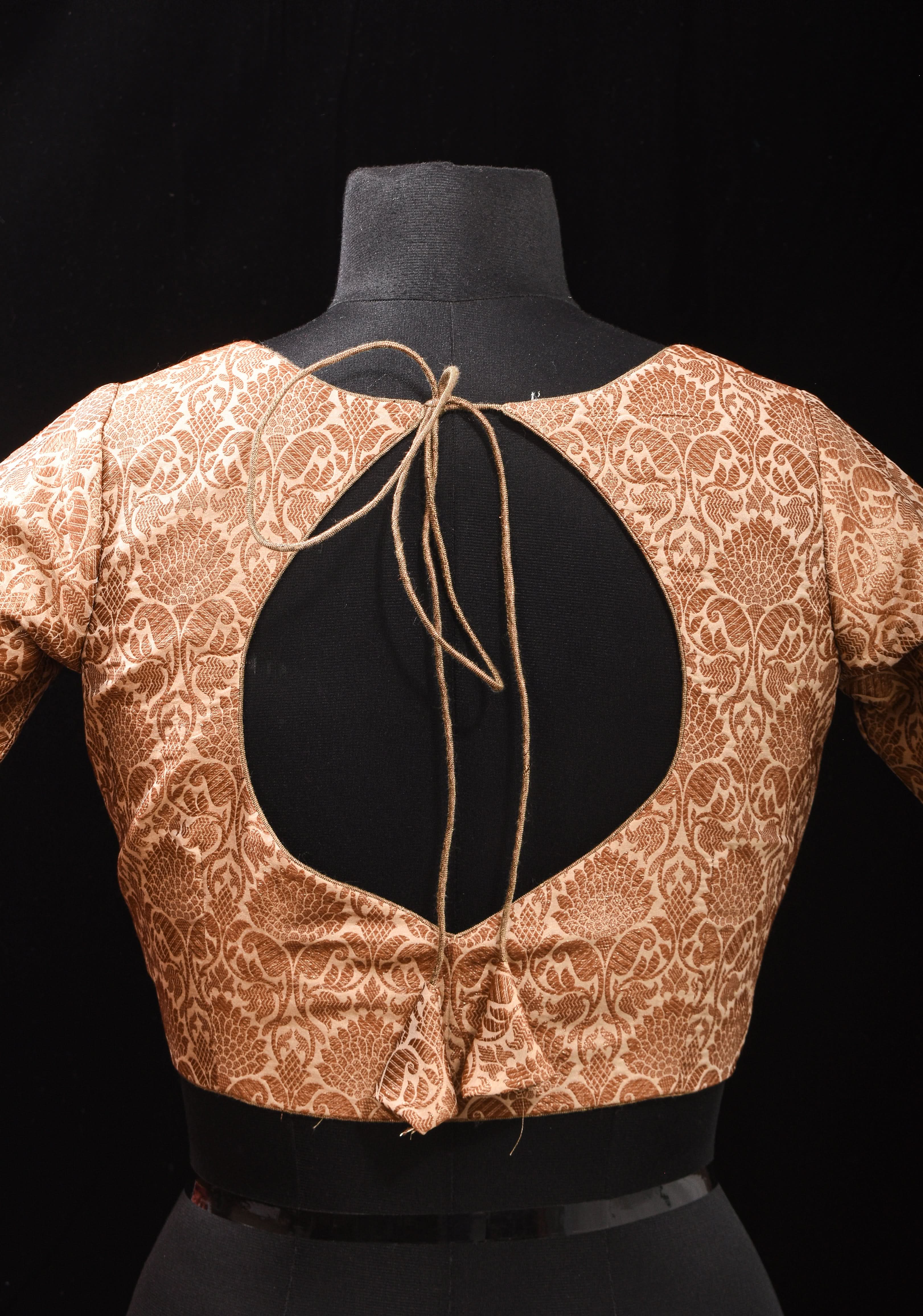 Elegant Antique Gold Floral Brocade Banarasi blouse with leaf and matka neck, Made to Order | Shobitam
