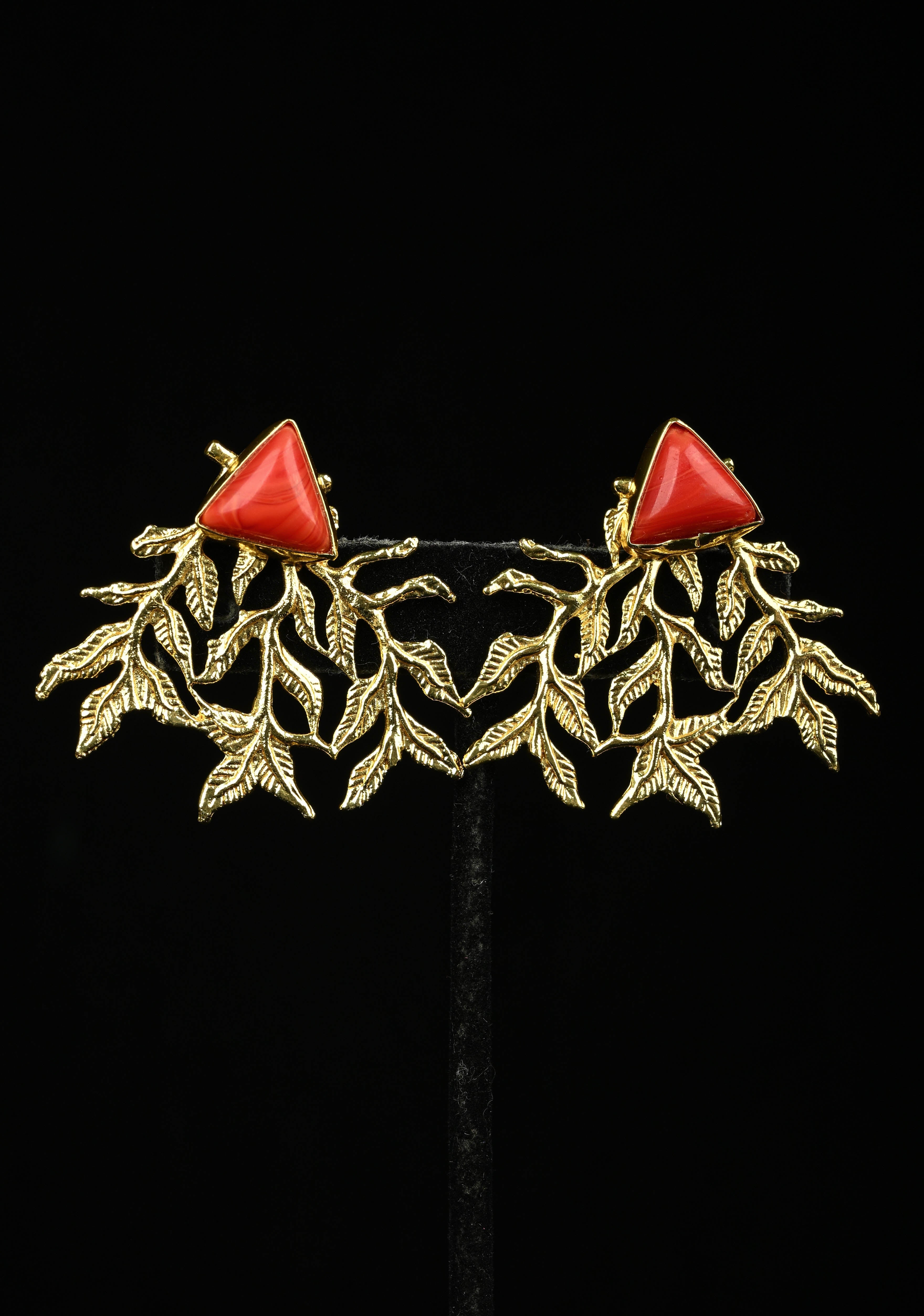 Stud Earring With Coral Triangular-Shaped Stone and Gold Leaf Design | Shobitam