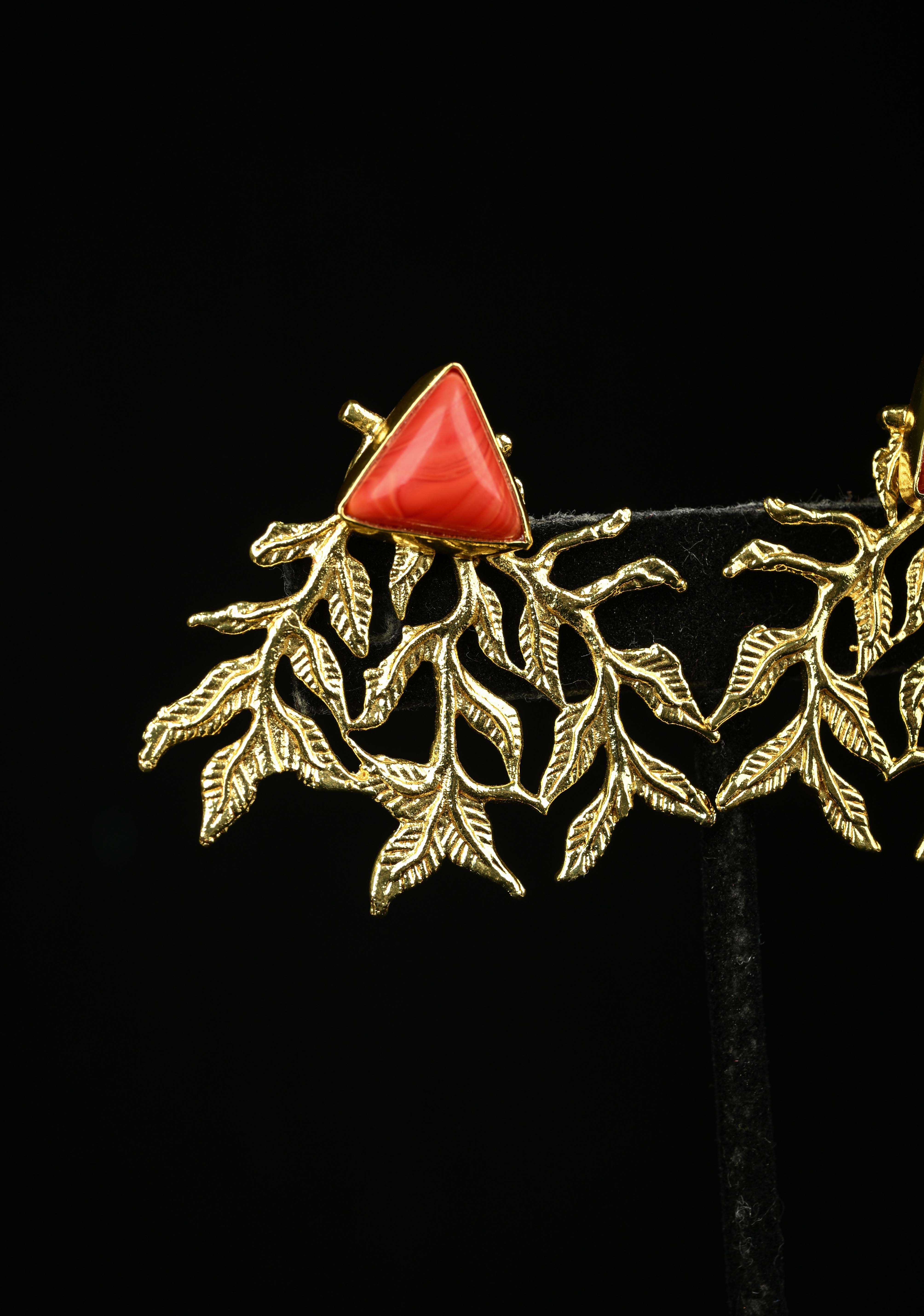 Stud Earring With Coral Triangular-Shaped Stone and Gold Leaf Design | Shobitam