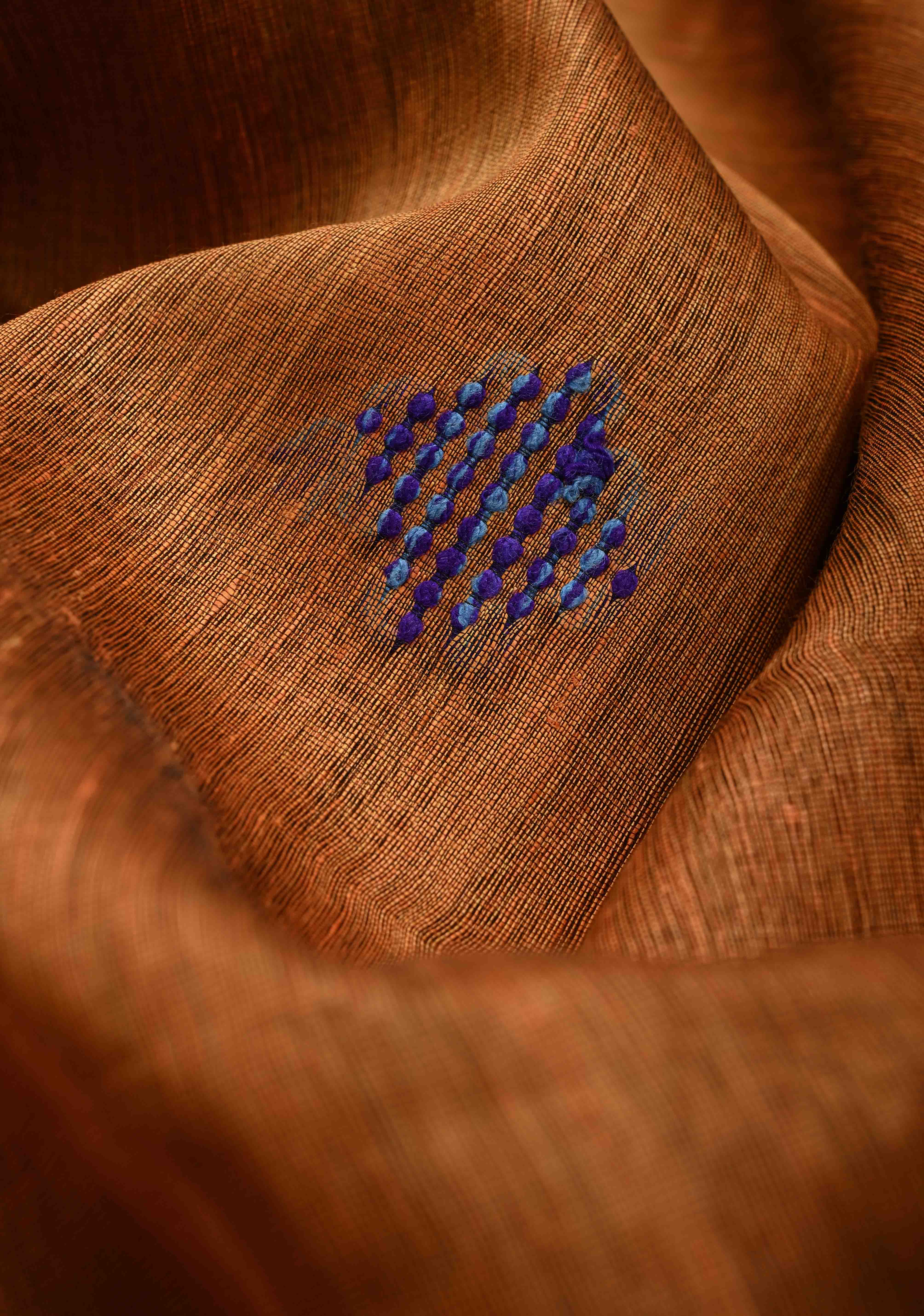 Rust Orange Handwoven Silk Linen Saree with Thread Buttas and Muted Zari Border | Shobitam