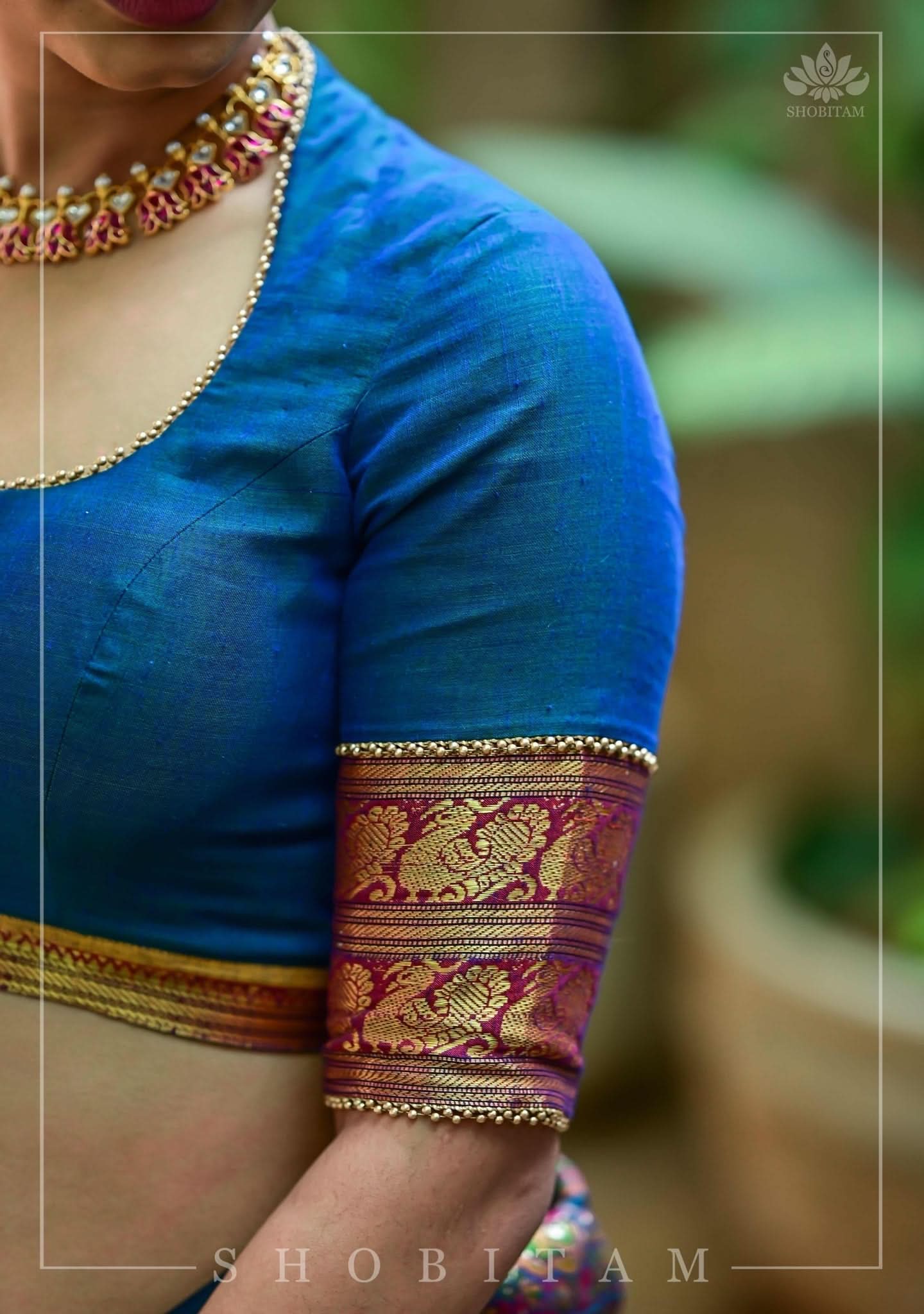 Teal Blue Narayanpet Cotton Blouse with cutout back and zari detailing | Shobitam