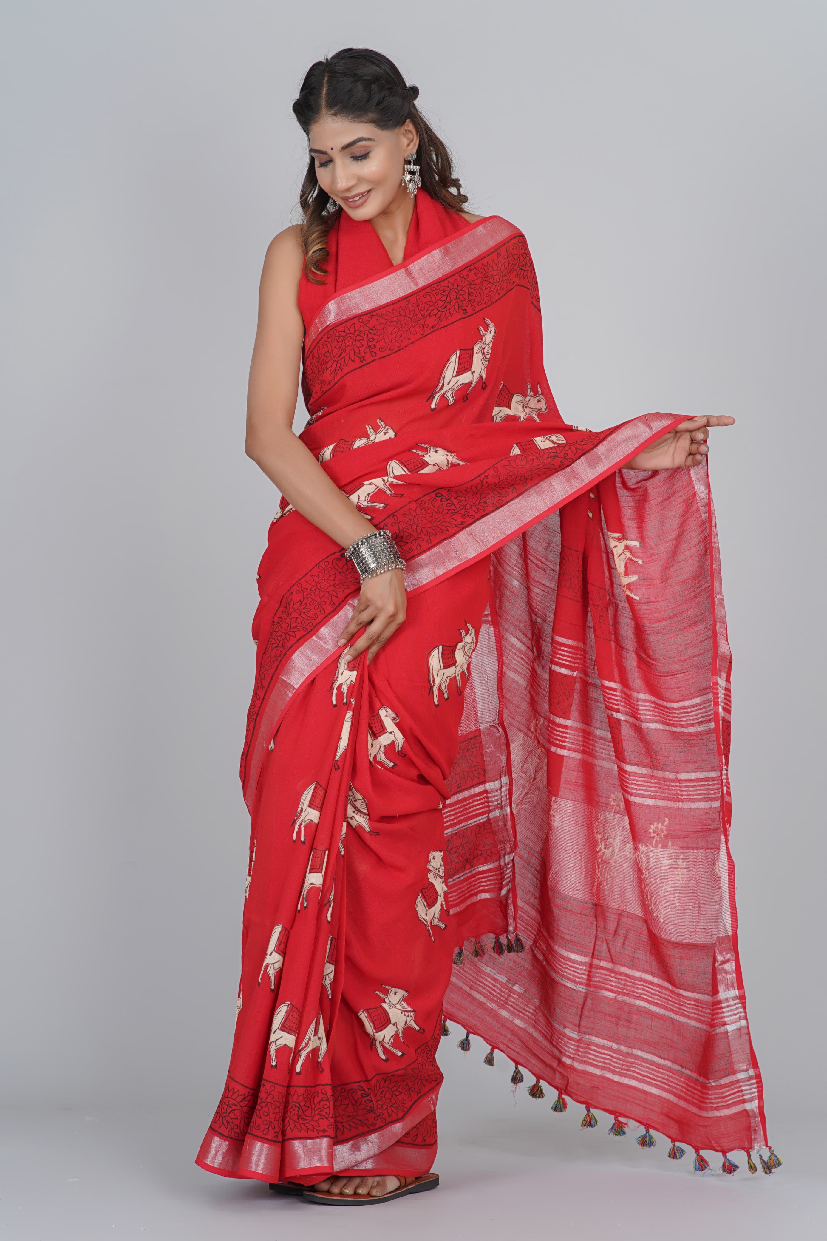 Ready to wear Soft Linen saree With Zari Woven Block Printed Border  & over all Animal print With Tassels