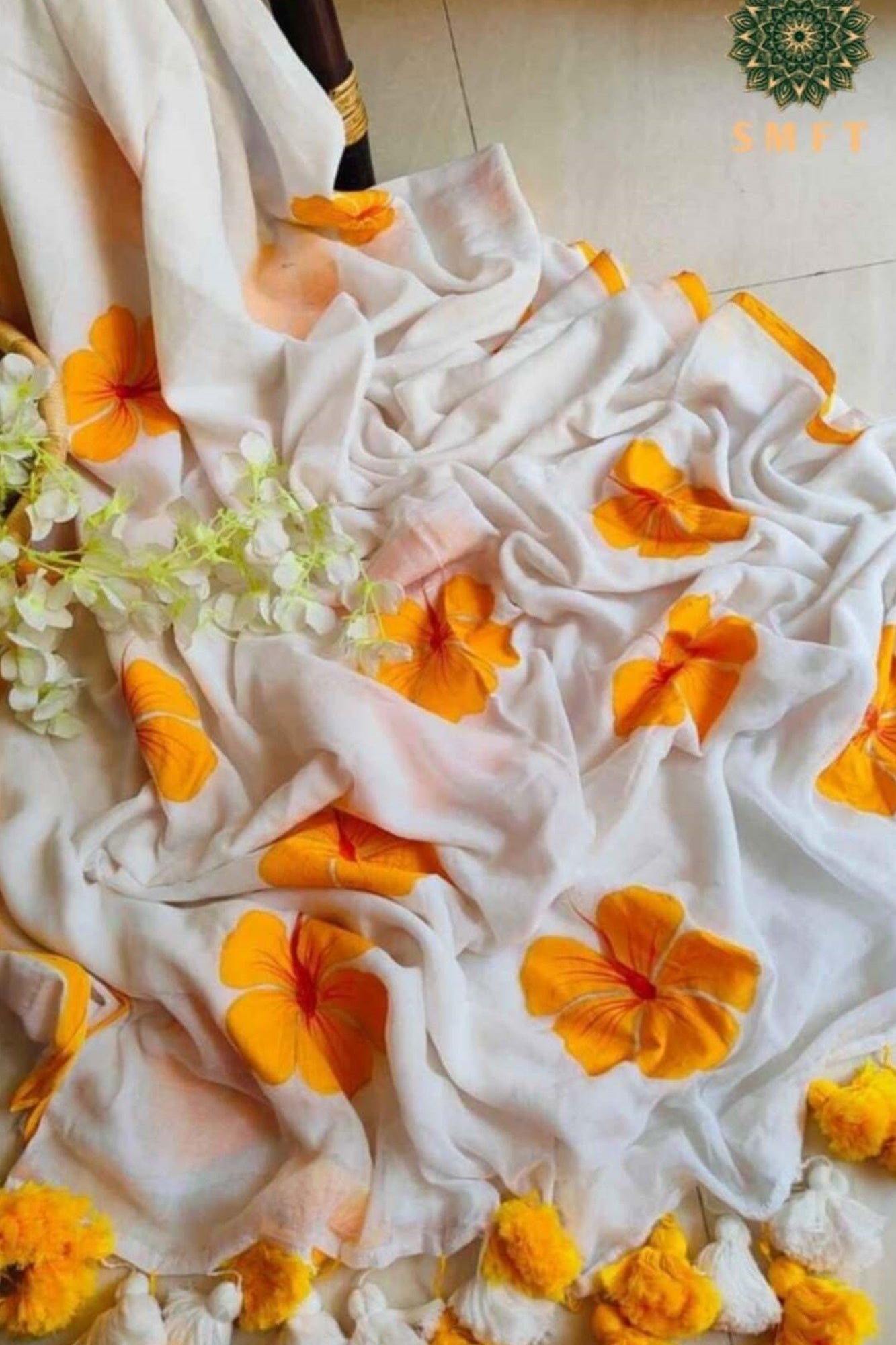 Soft White & Musturd Foral Print Mul Mul Cotton With Pom Pom On border Pre Drape Saree