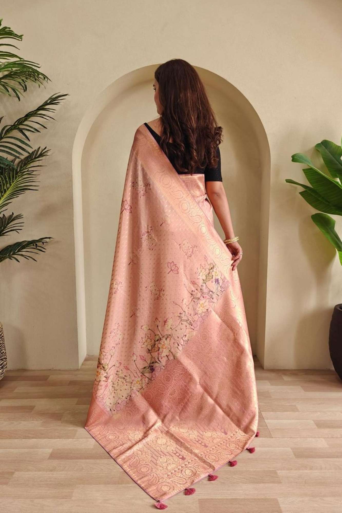 Peach Viscose Georgette Silk with Woven Detailing, Digital Prints & Tassels Ready To Wear Saree
