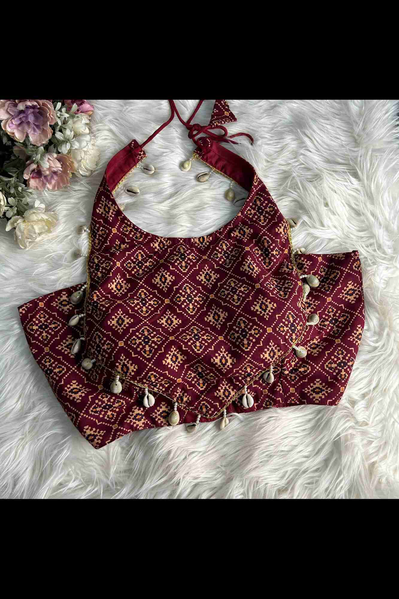 Red Designed Kodi Lace And Latkans  With Batik Printed Sleeves Less Designer Blouse