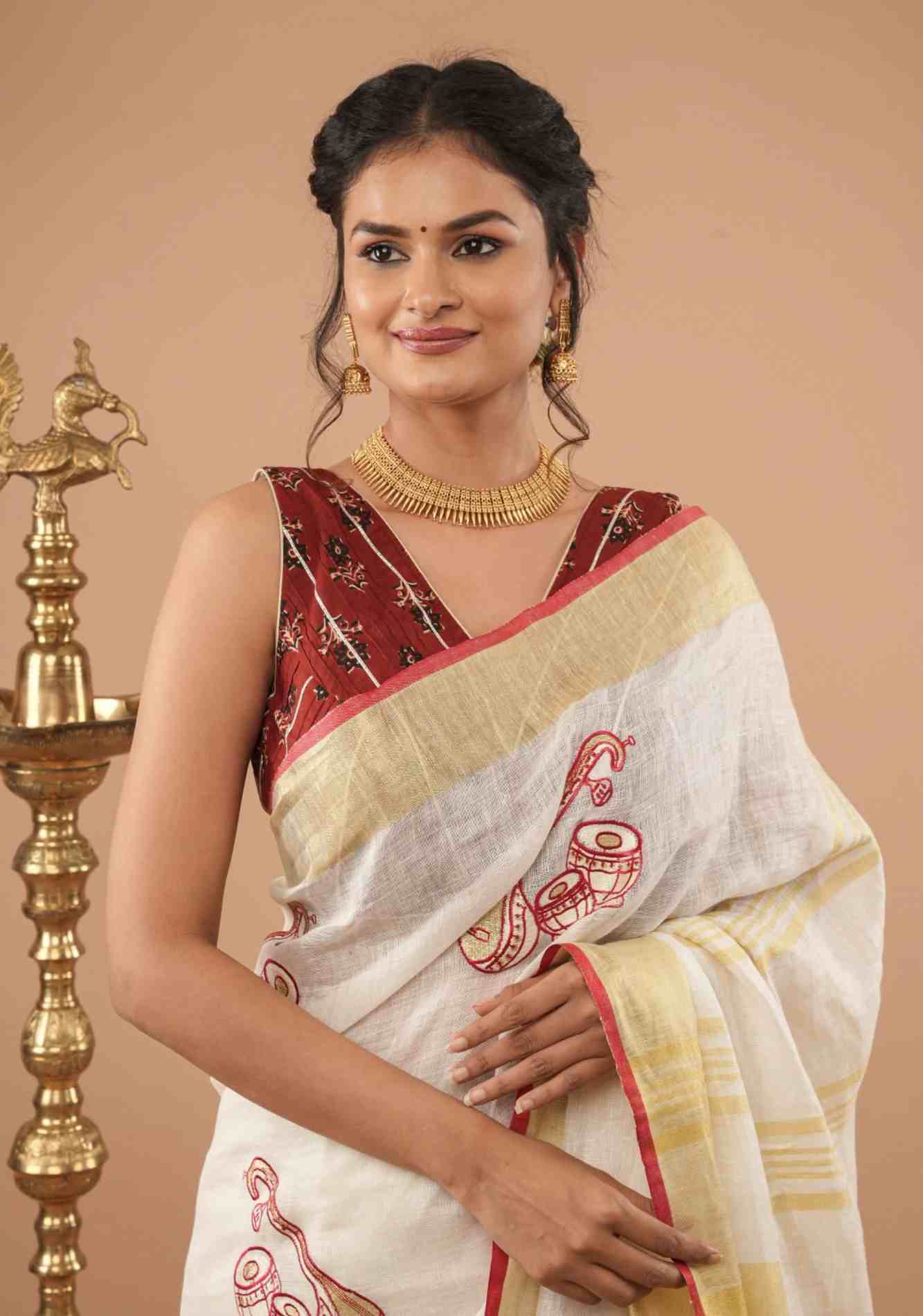 Linen by Linen Saree in White with Musical instruments embroidery motifs