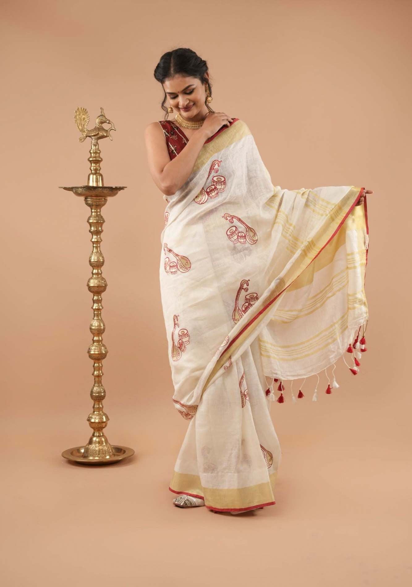 Linen by Linen Saree in White with Musical instruments embroidery motifs