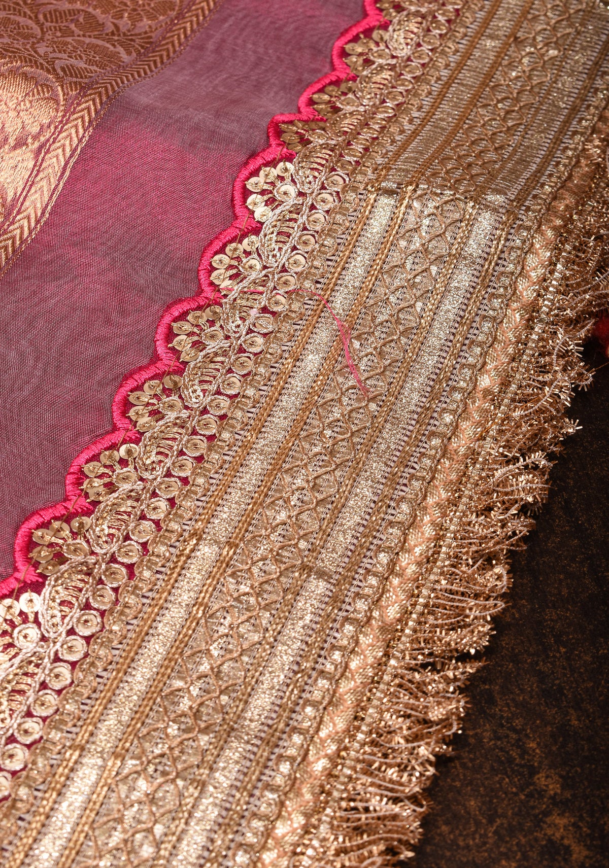 Trendy Pure Banarasi Tissue Silk Saree in Pinkish Red with Fancy Lace Trim and Sona Rupa Floral Buttas | SILK MARK CERTIFIED | SHOBITAM