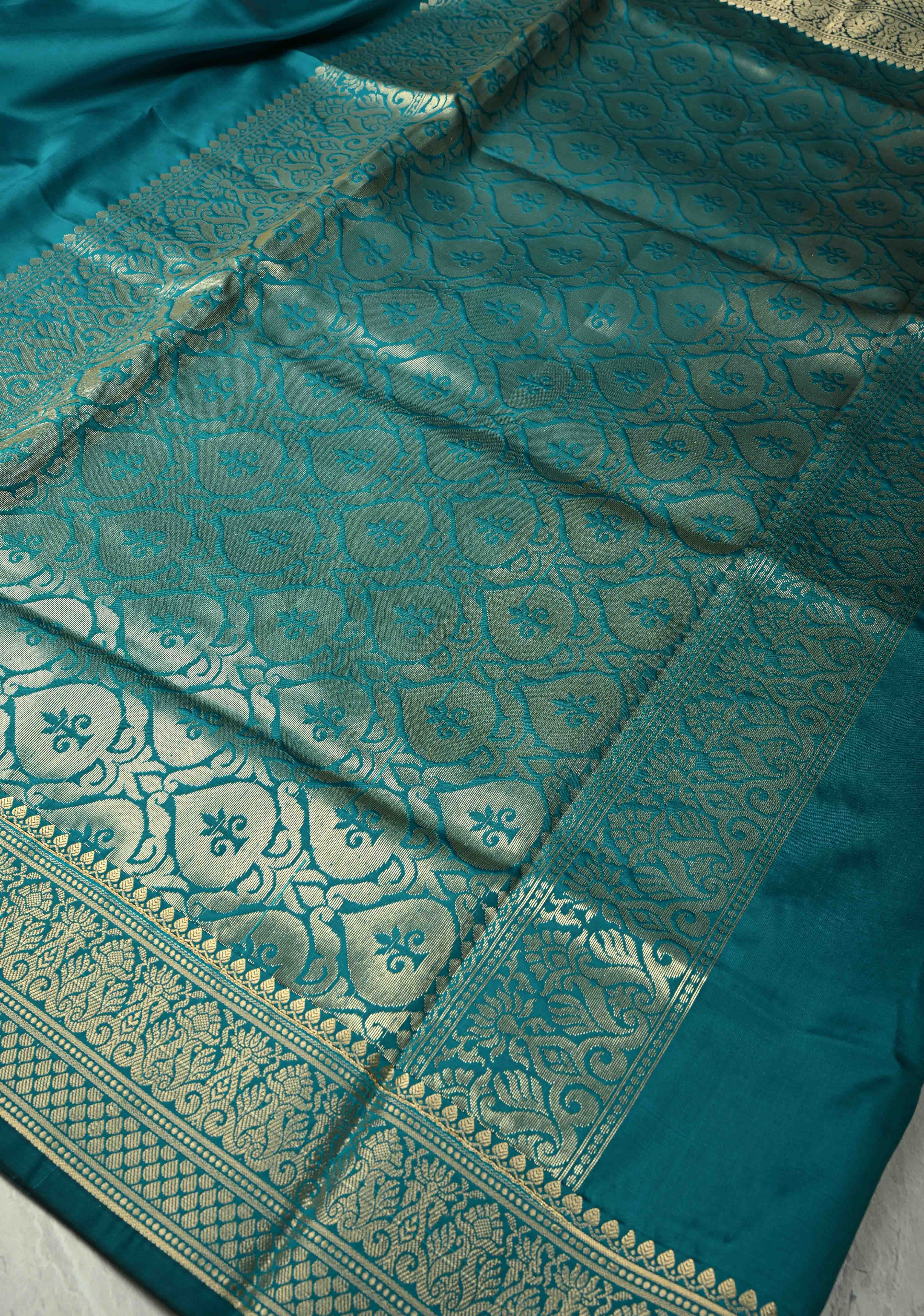 Persian Green Semi Silk Saree with Floral Zari Border, Brocade Blouse Piece | Shobitam