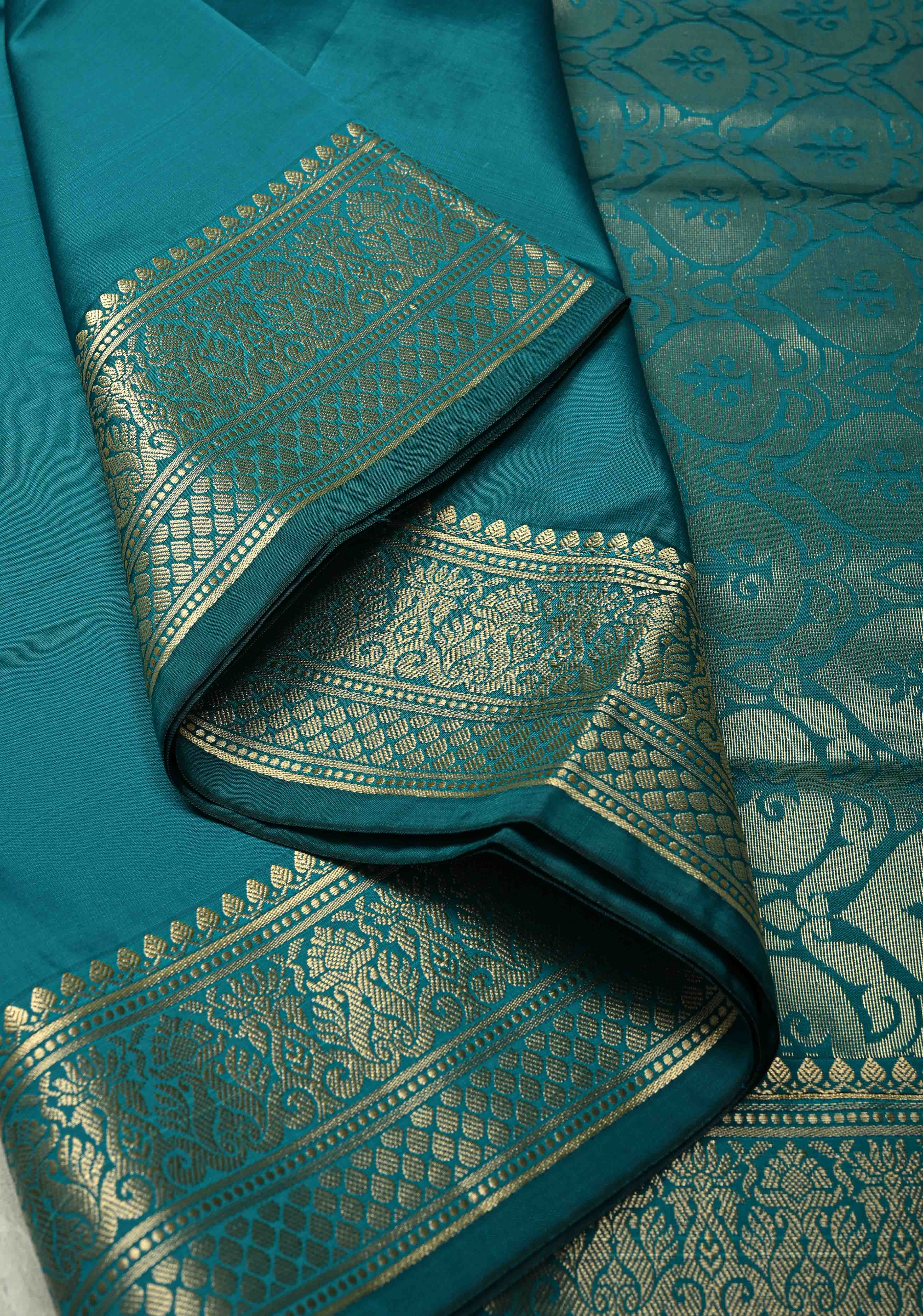 Persian Green Semi Silk Saree with Floral Zari Border, Brocade Blouse Piece | Shobitam