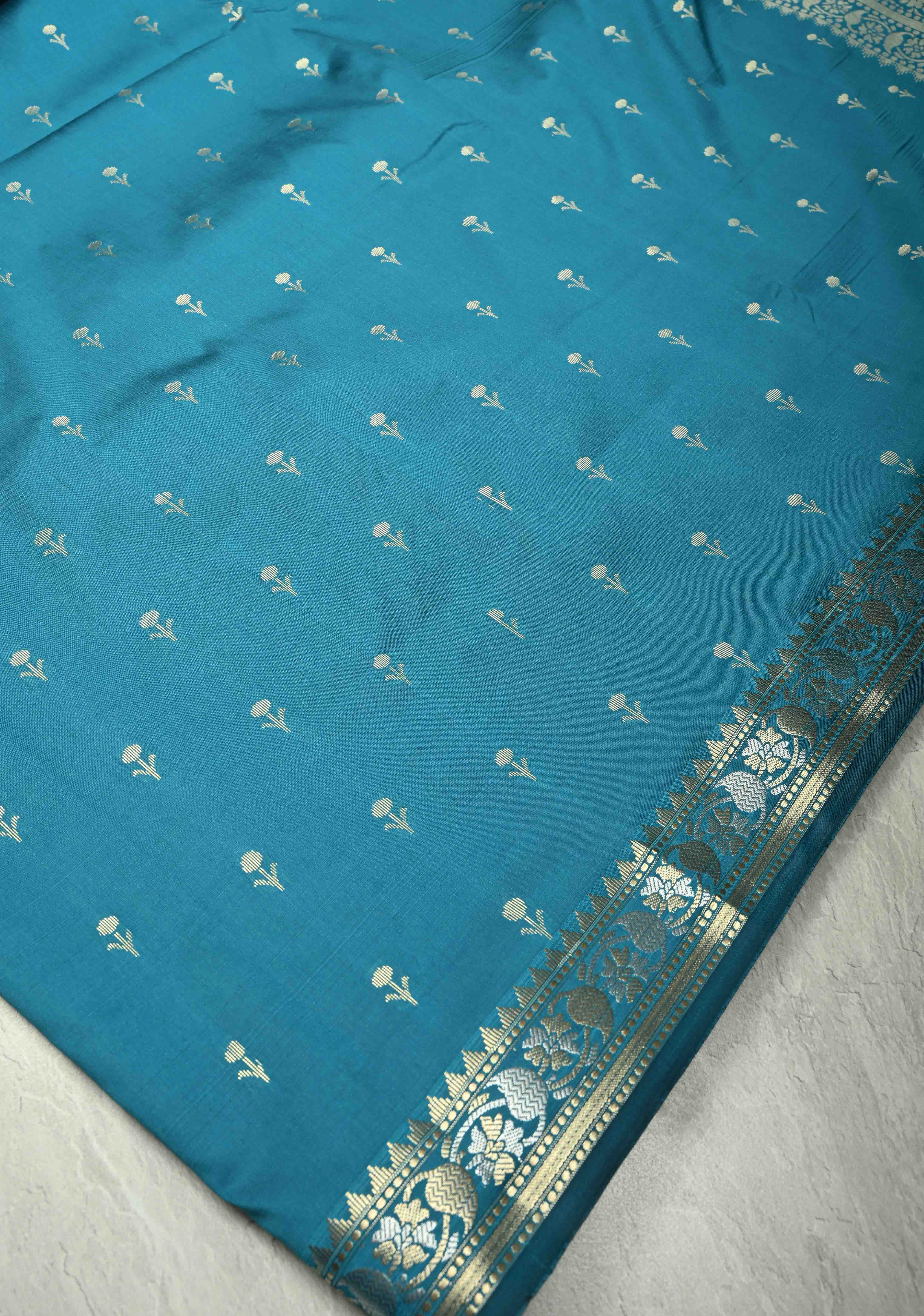 Peacock Blue Semi Silk Saree with Floral Buttis and Alfi Zari Border | Shobitam