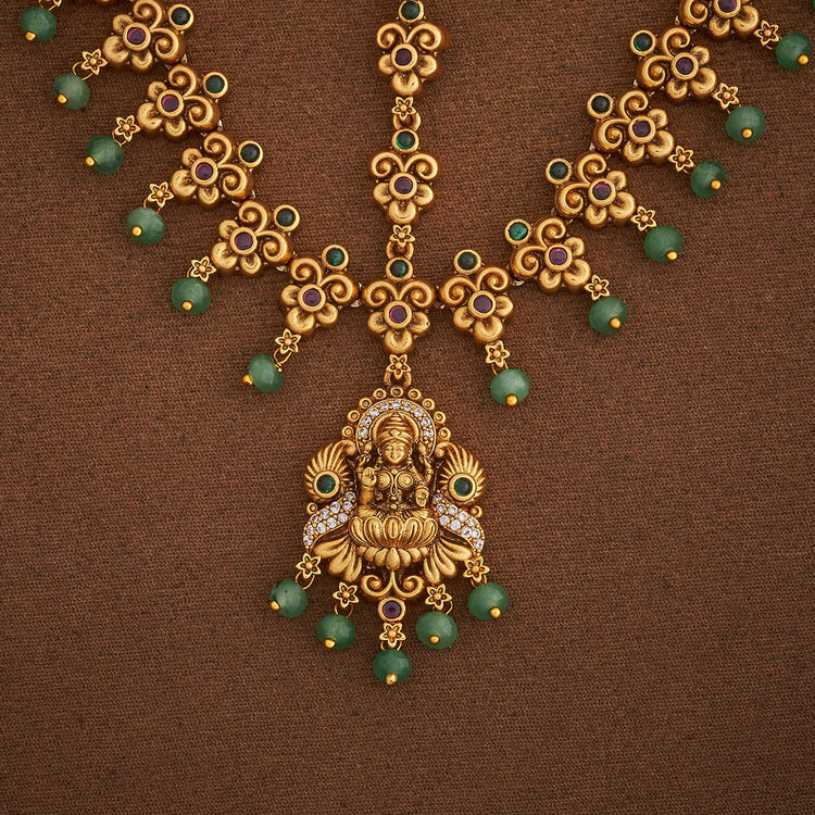 Fashion Jewellery with Lakshmi Pendant Antique Tikka with Dangling Pearls | Shobitam