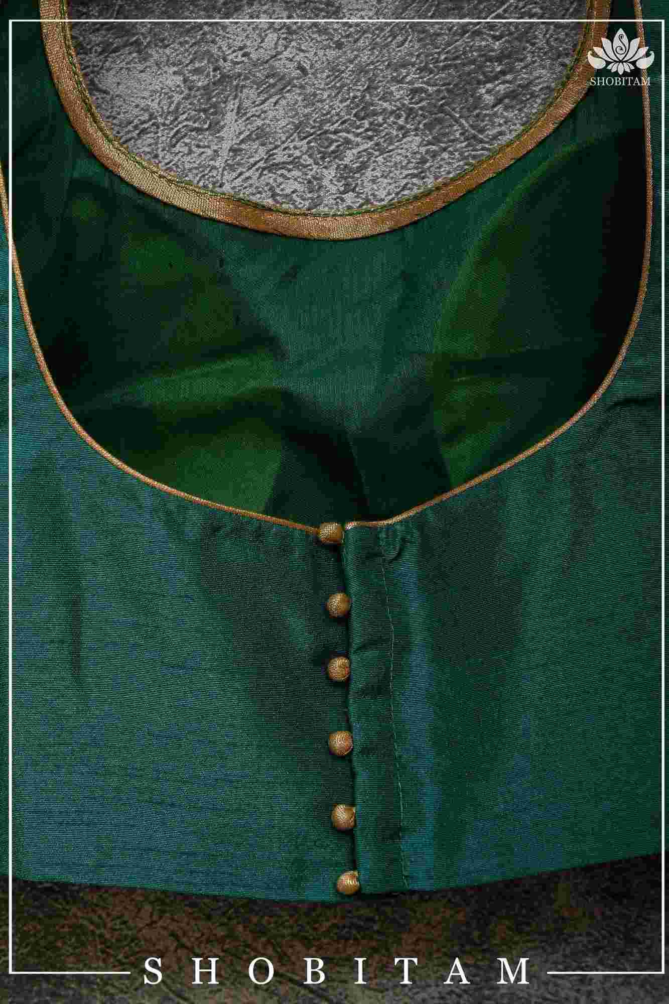 Made to Order:  Necklace Design Jadau Ornamental Sleeveless Blouse in Green Raw SIlk | Shobitam Blouse