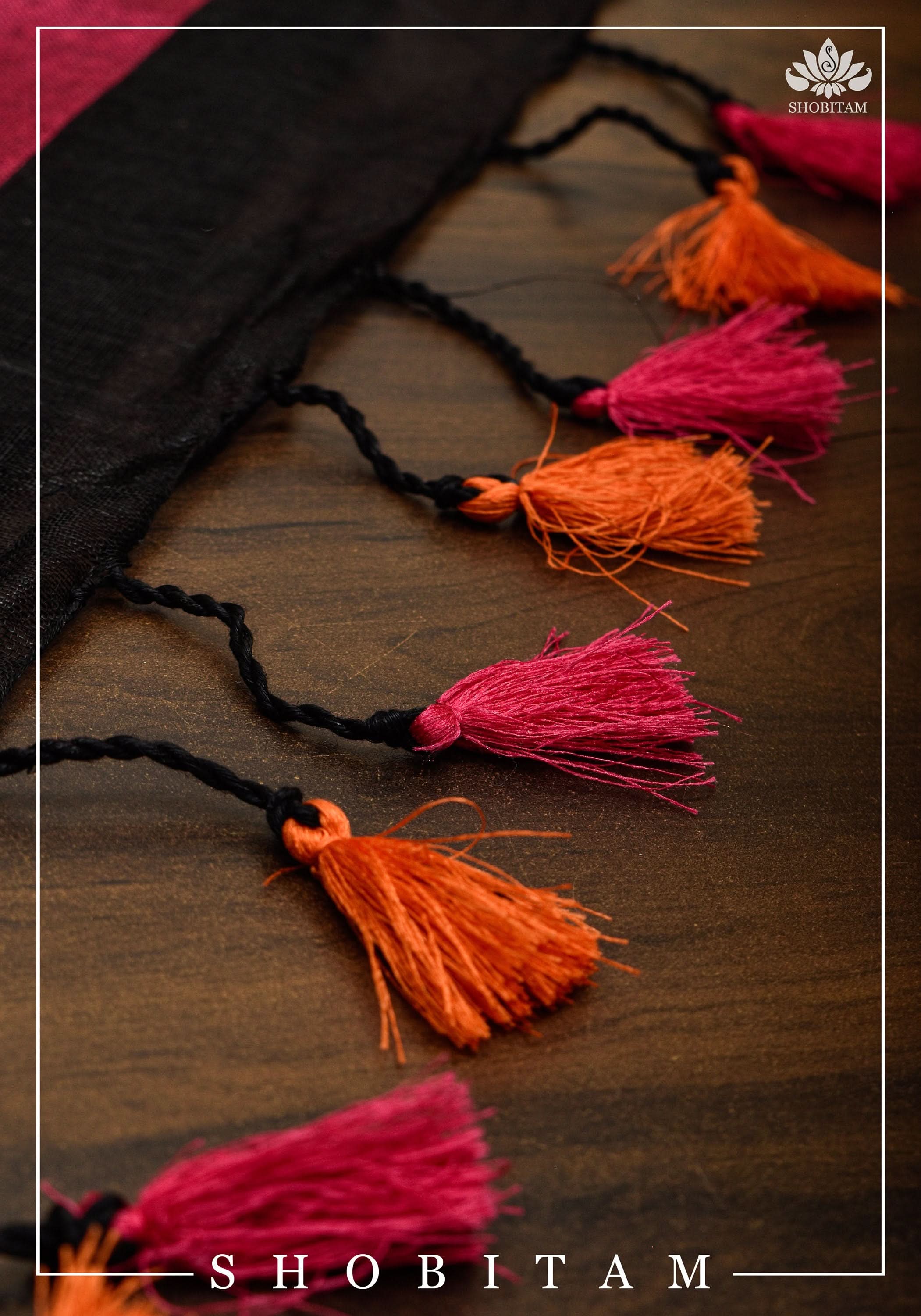 Ganga Jamuna Borders on Black Linen by Linen Saree | Sarees by Shobitam
