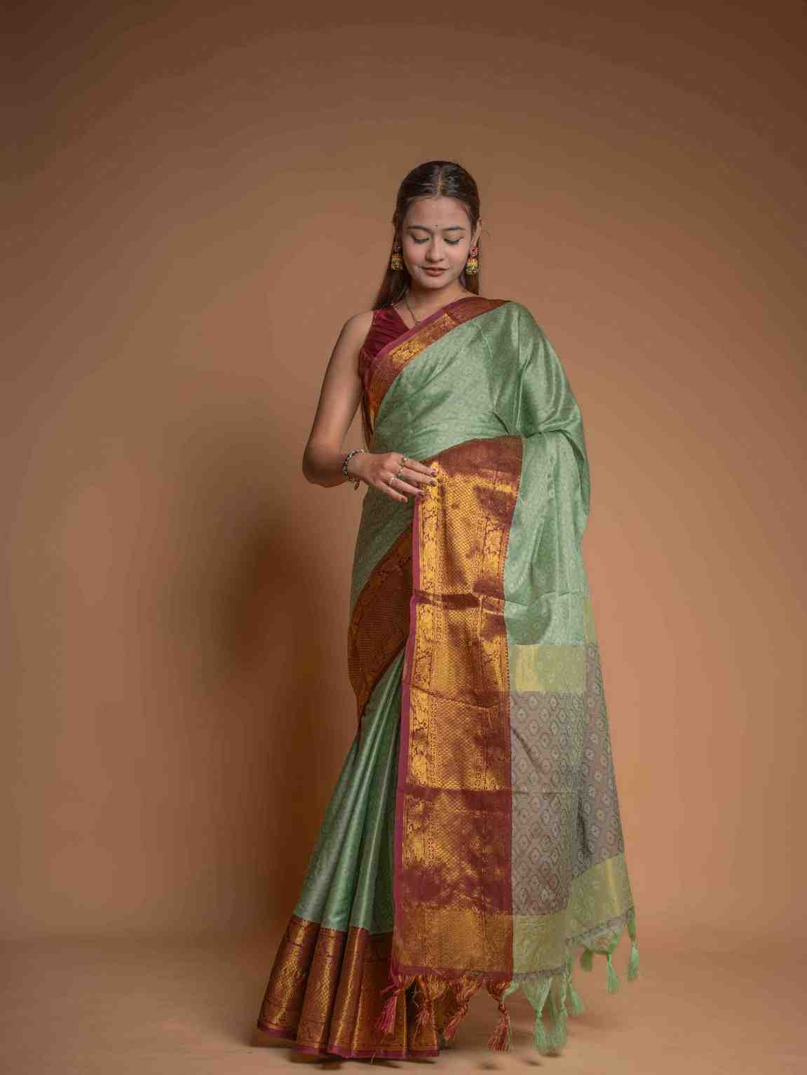 Graceful Mint Green Silk  with Rich Zari Border Ready To Wear Saree