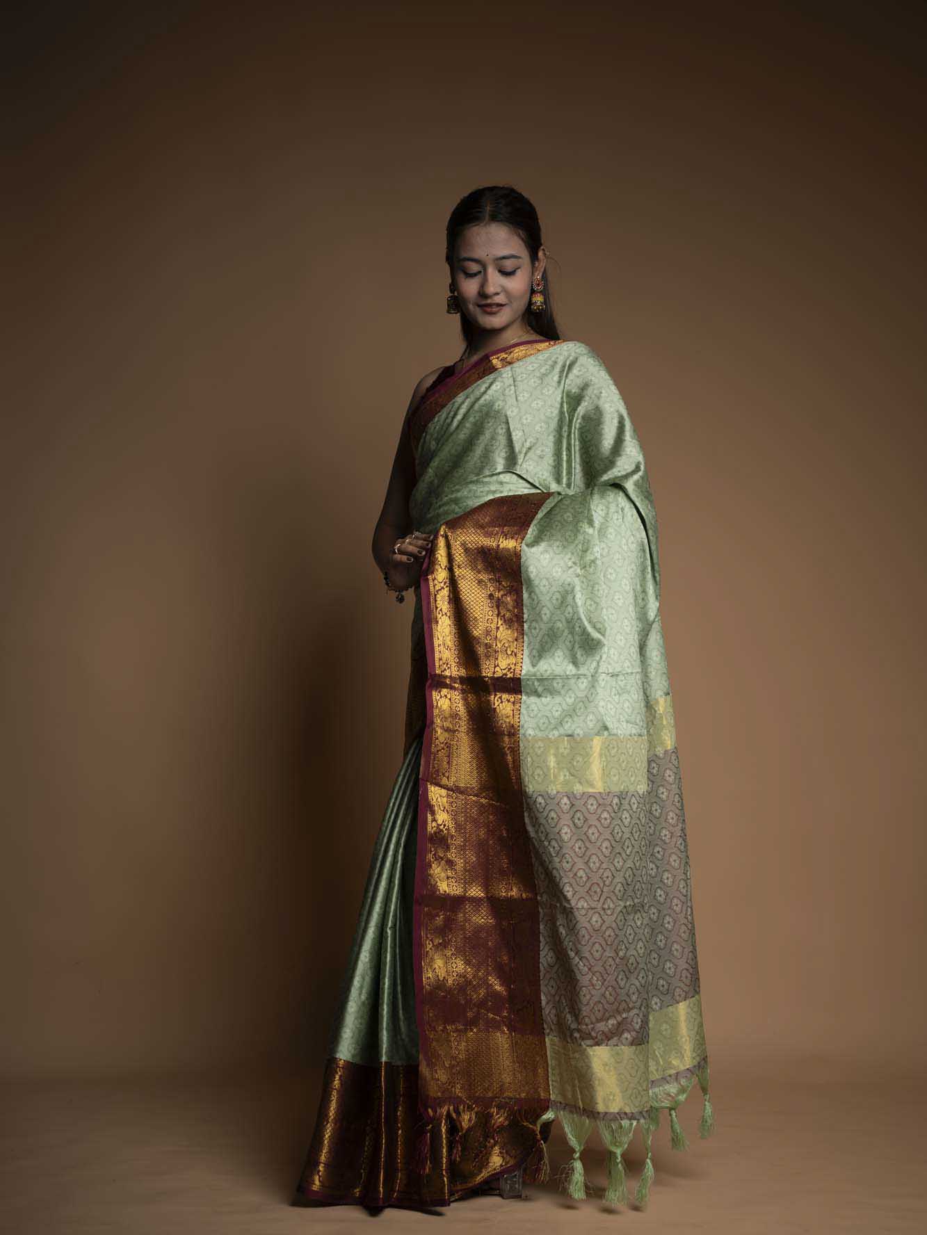 Graceful Mint Green Silk  with Rich Zari Border Ready To Wear Saree