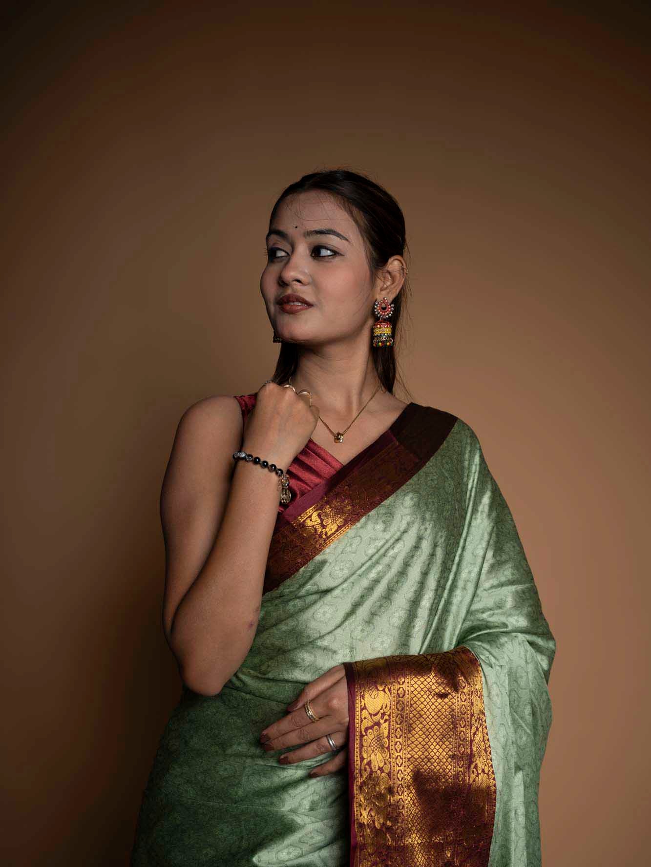 Graceful Mint Green Silk  with Rich Zari Border Ready To Wear Saree