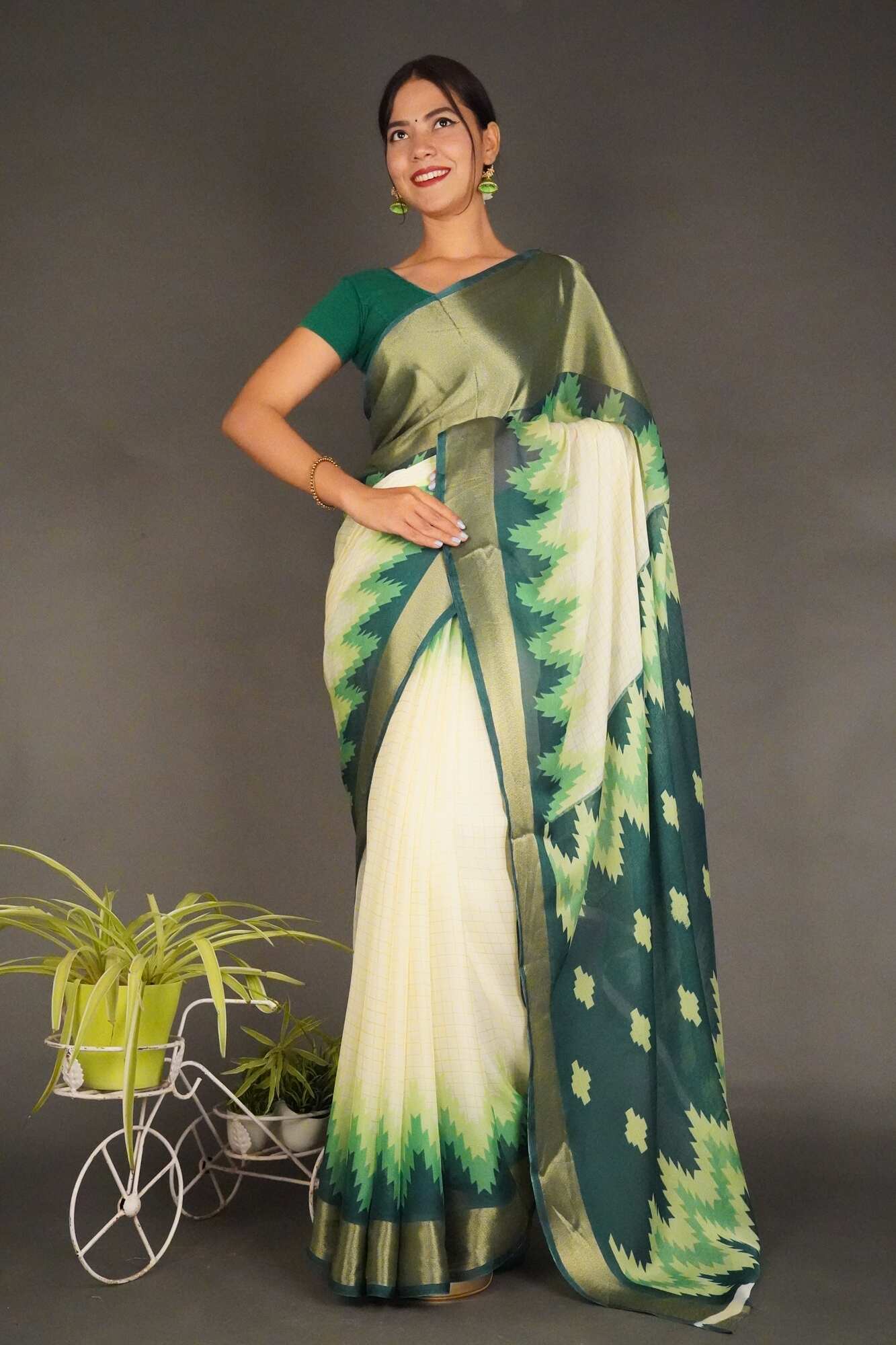 Off white saree 2024 with green border