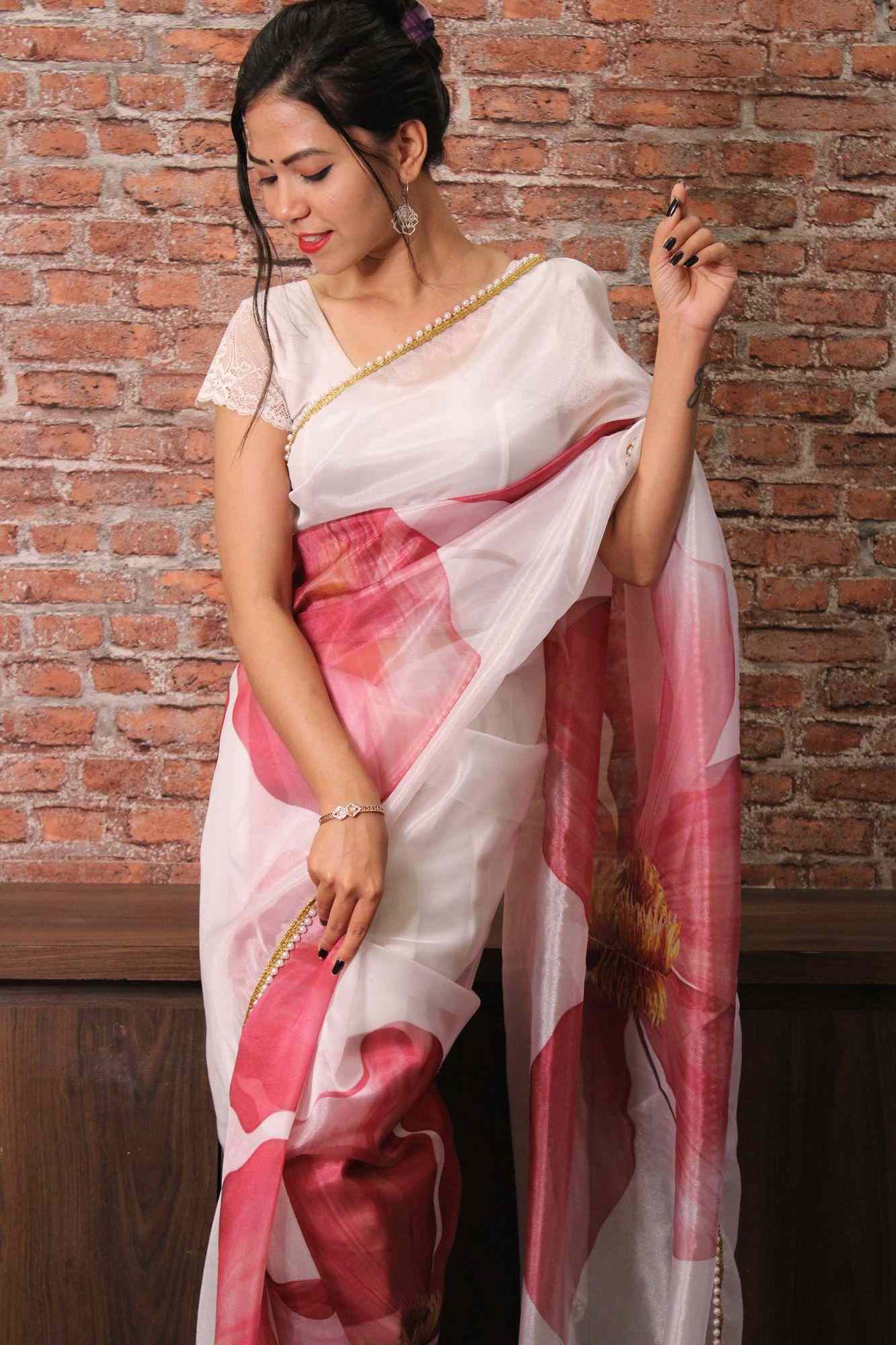 Off white and pink floral organza with moti lace border wrap in minute saree