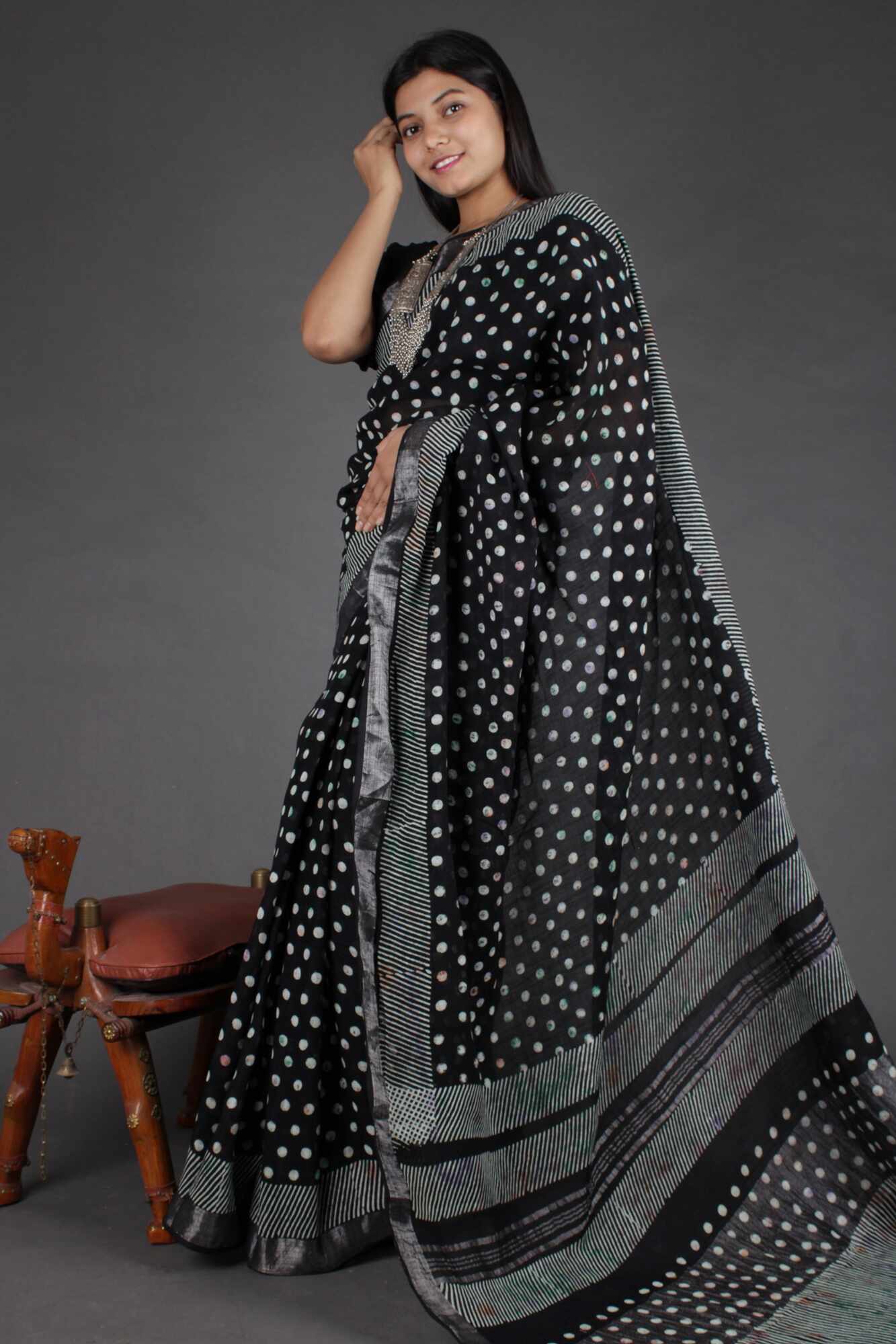 Saree : white black dot printed american crepe ruffle saree